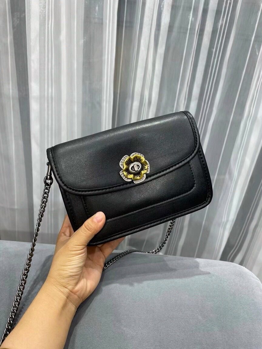 Túi Coach da thật khoá Hoa Trà