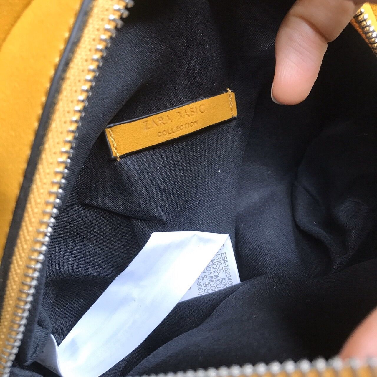 Ví cầm tay Zara da lộn