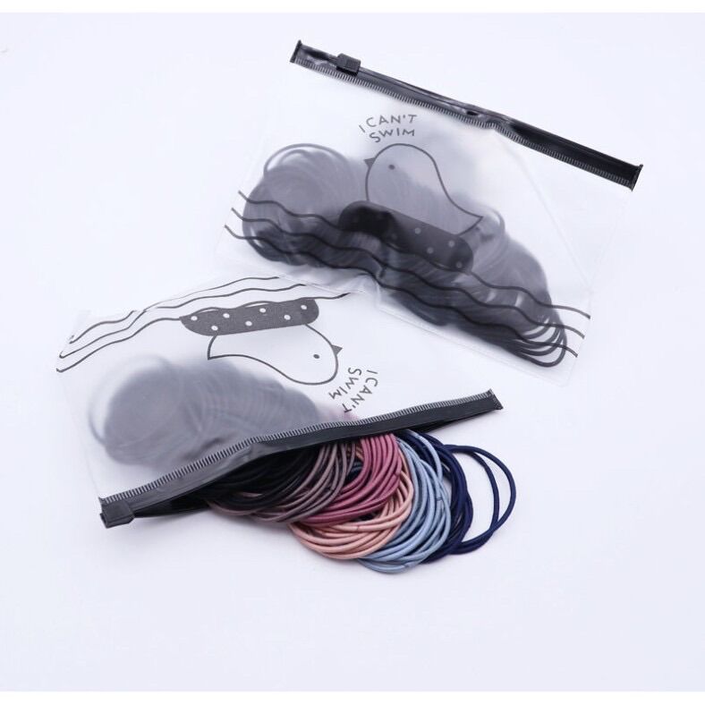 Set 100 thun buộc tóc kèm túi zip