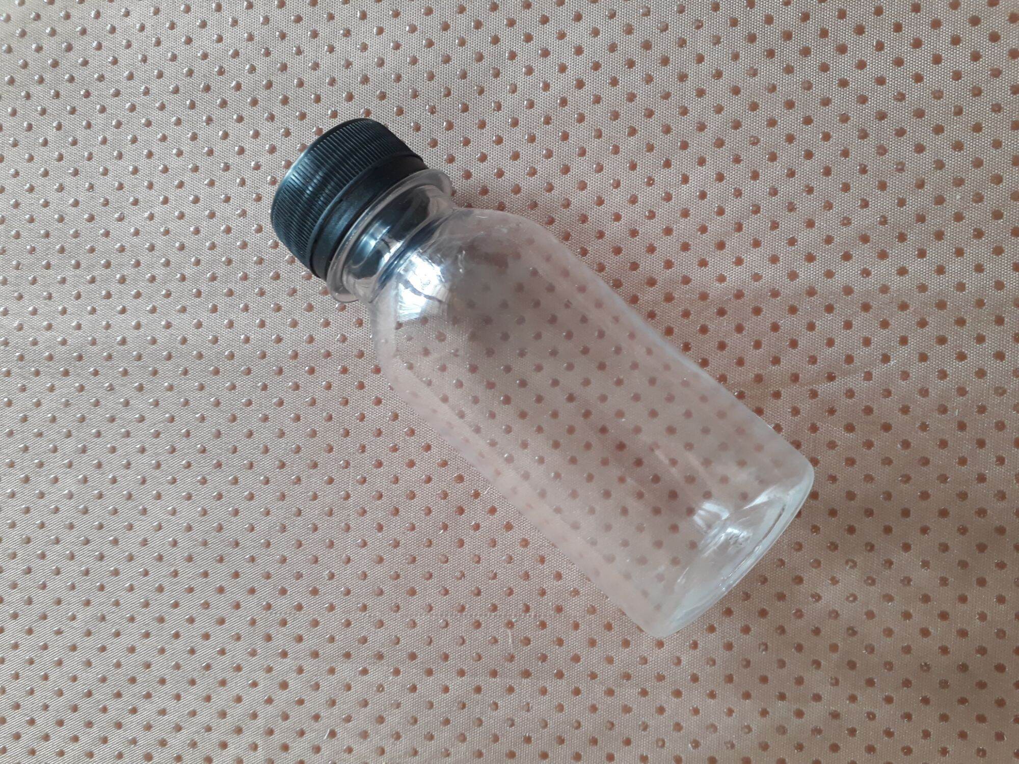 10 chai nhựa 100ml- 120ml đã kèm nắp đen ( trắng)