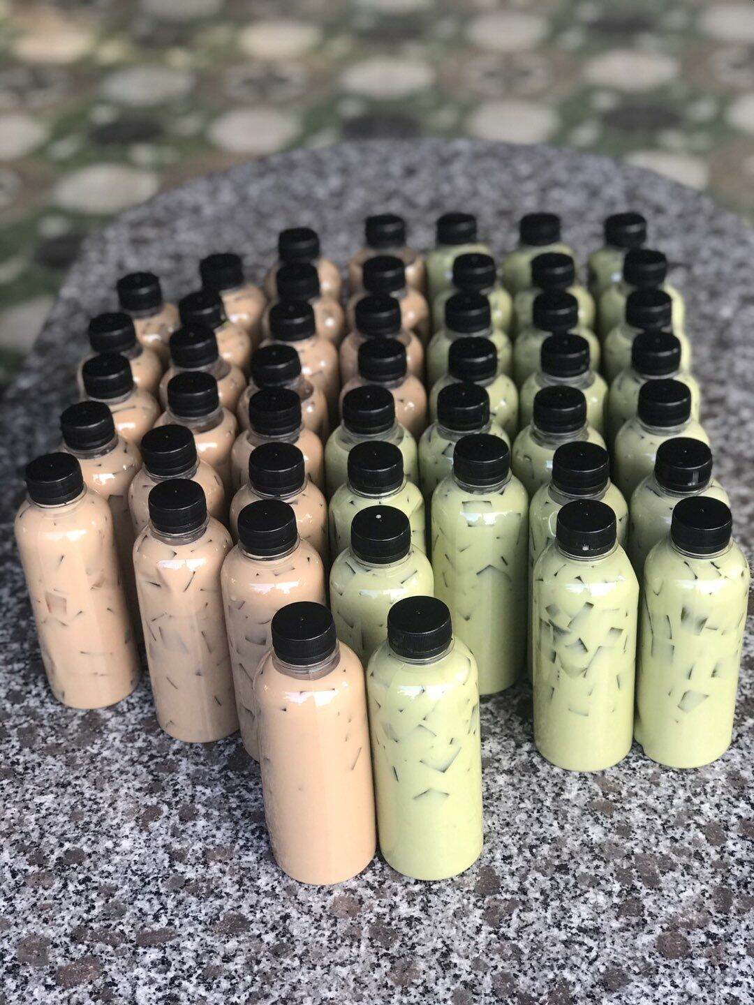 50 Chai nhựa tròn nắp đen 330ml. chai nhựa đựng trà sữa