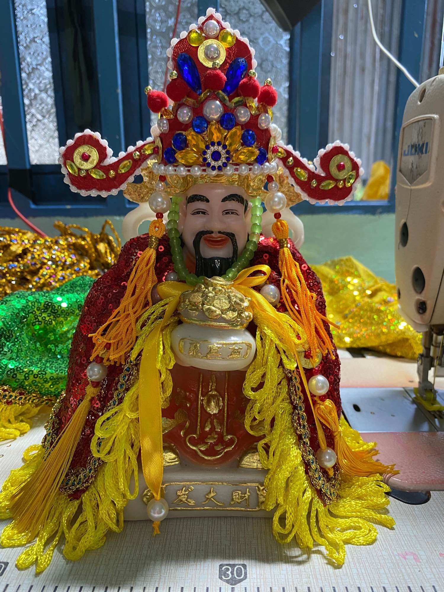 Áo mão ông thần tiền