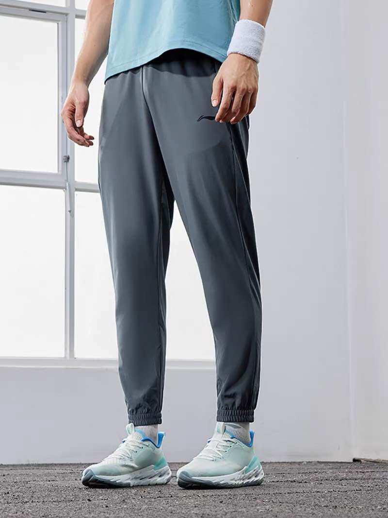 Quần gió nam Lining AYKS355-1