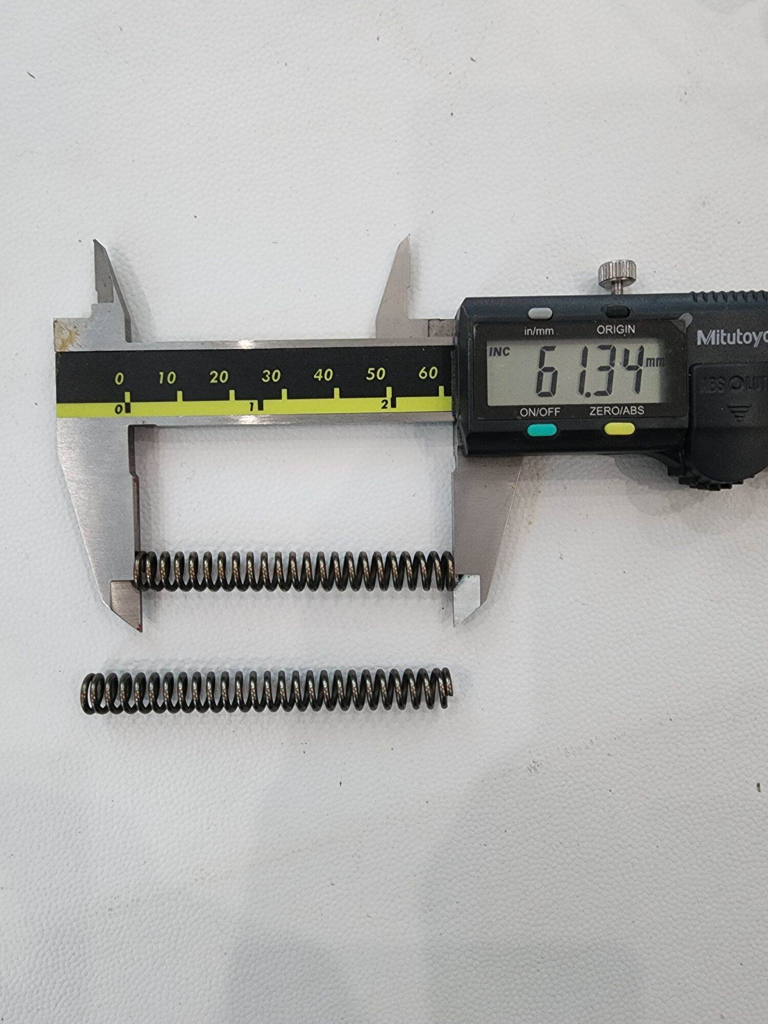 Lò xo phi 8 sợi 1.3 dài 6cm 7cm