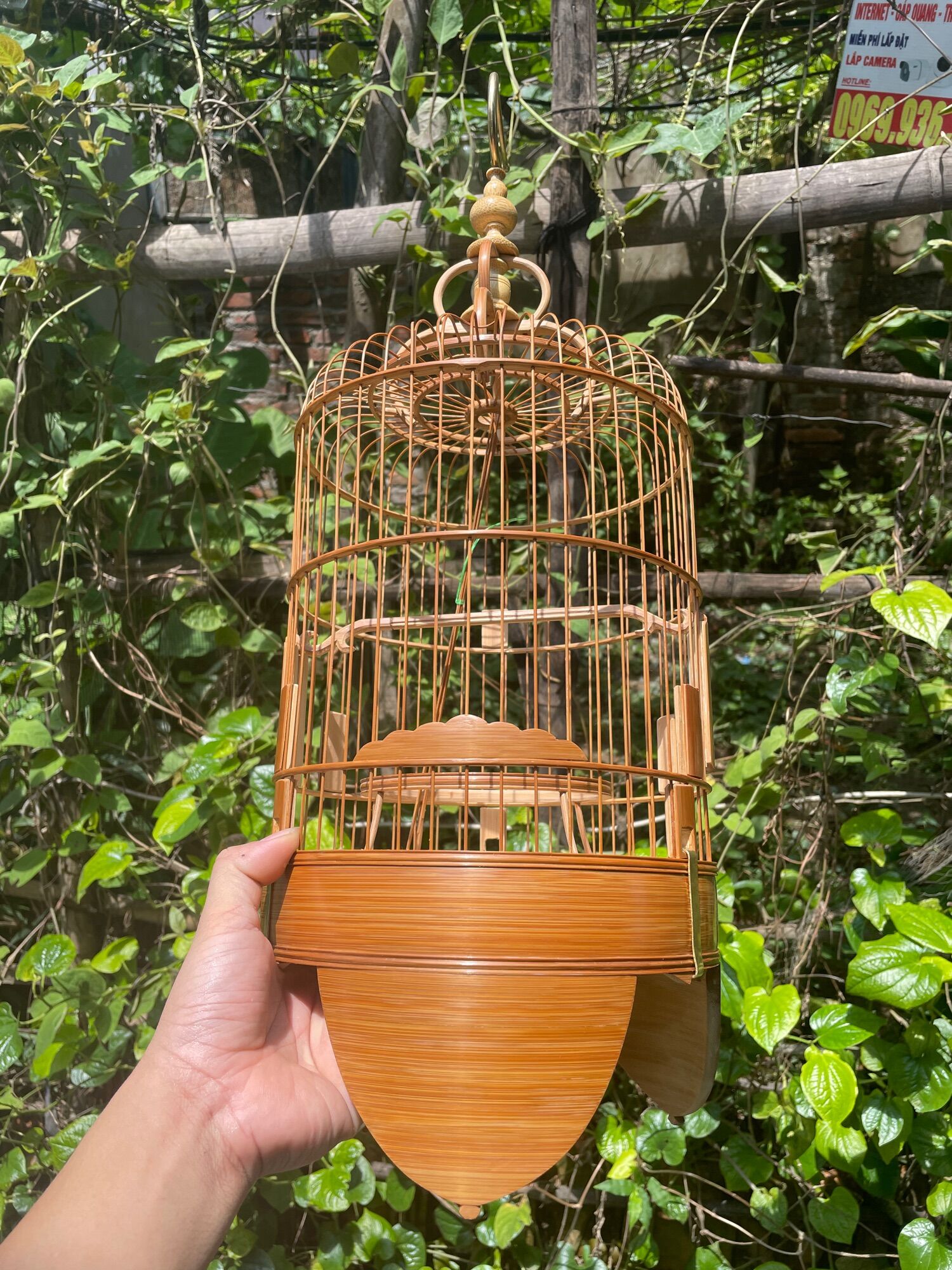 Lồng chim khuyên kỹ giả tầu