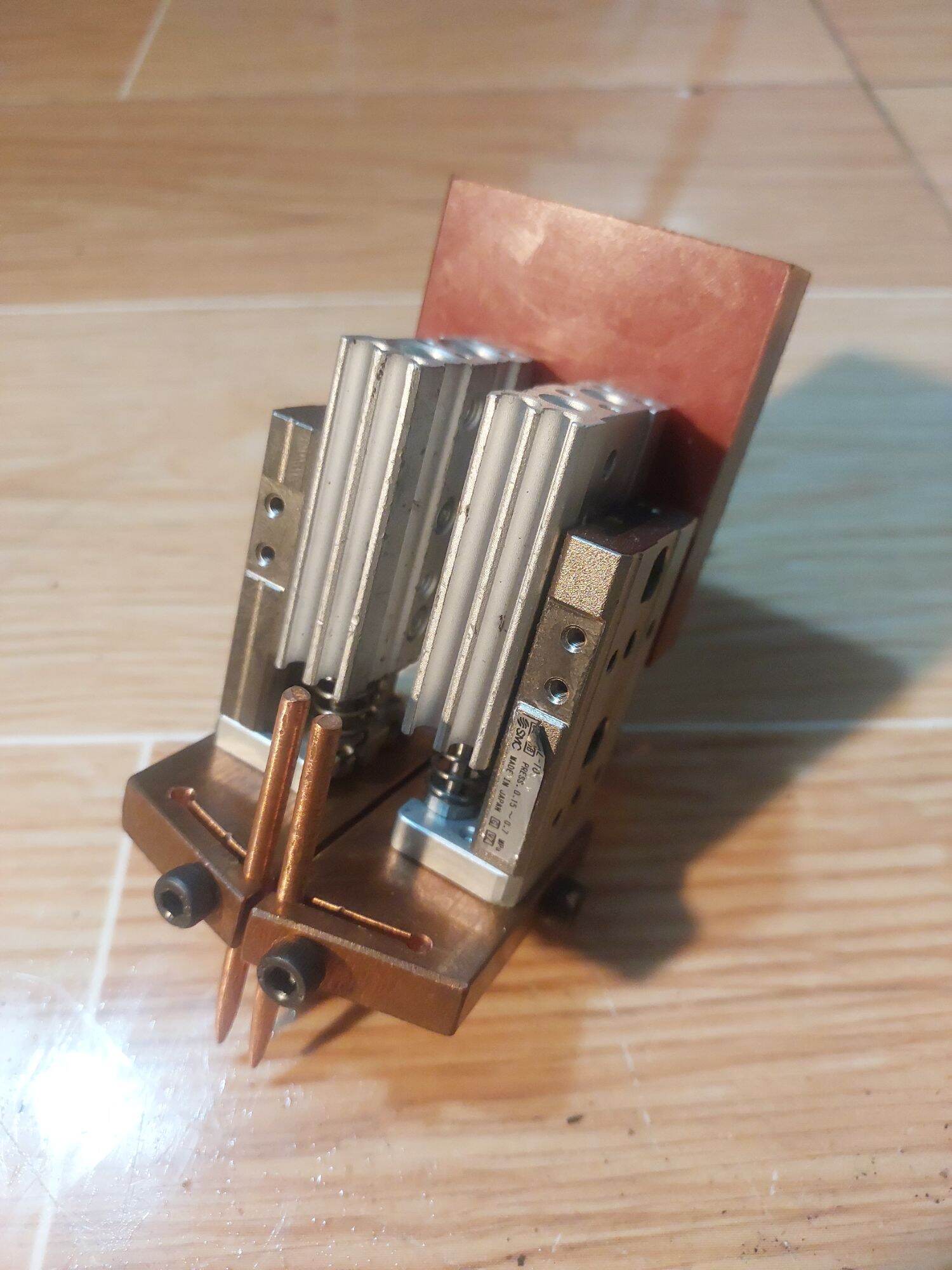 cụm căn lực (chế trụ hàn pin)