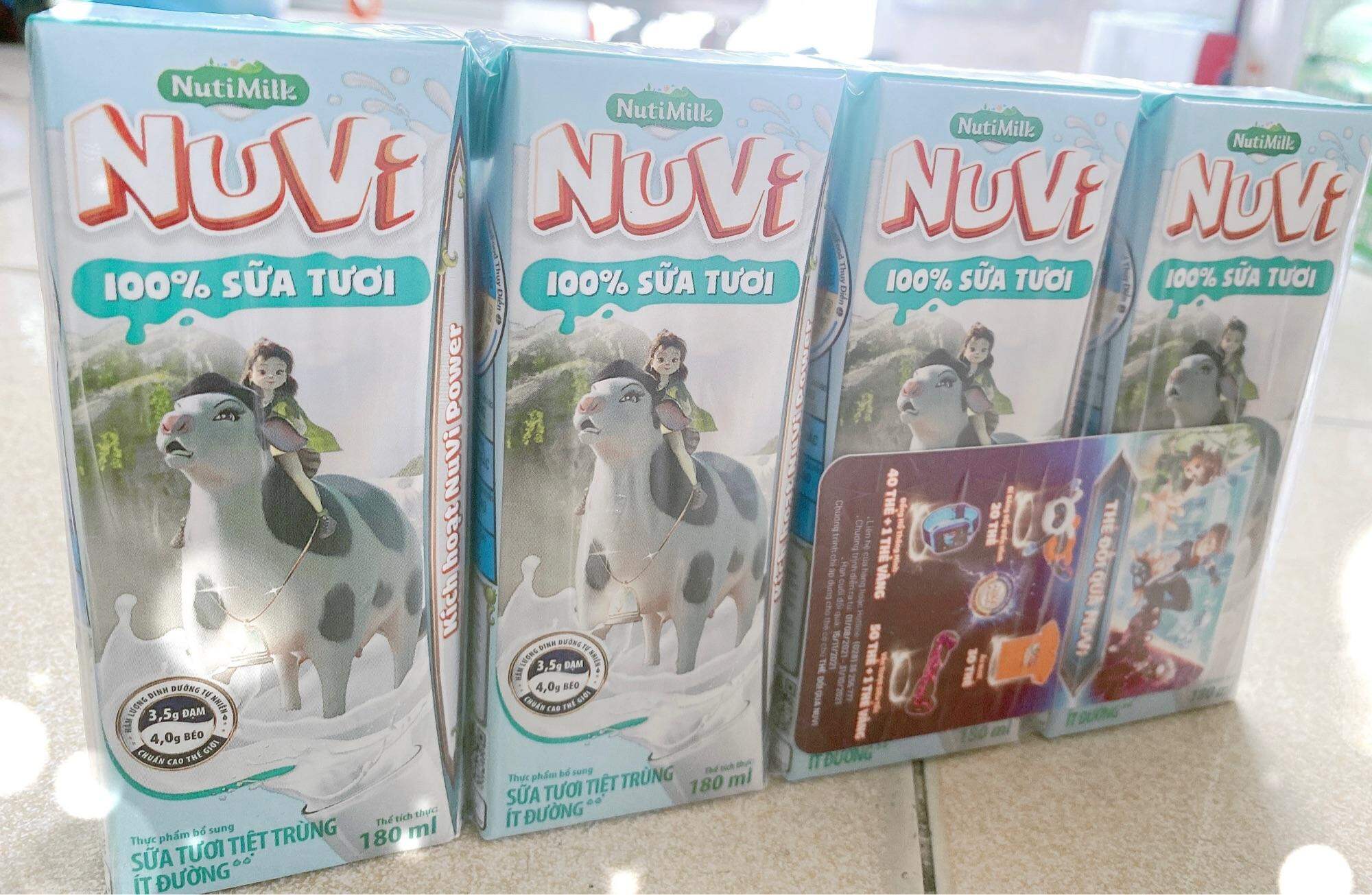 Sữa tươi NUVi ít đường 180ml . Sưu tầm thẻ đổi quà