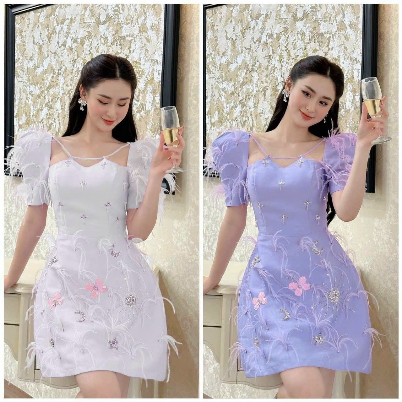 Đầm cổ u tay phồng kim sa lông vũ