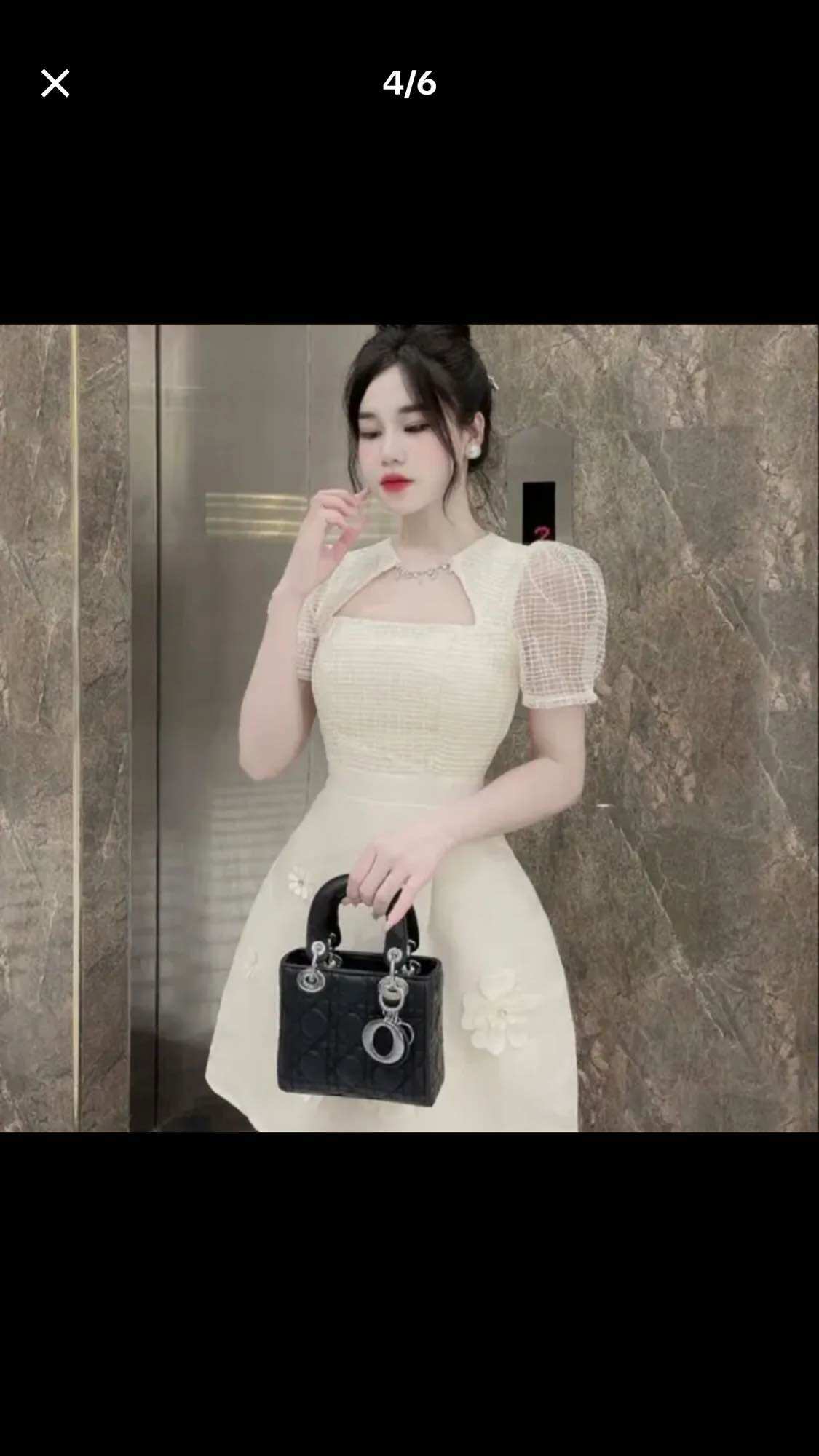 Đầm dự tiệc dáng xoè cổ đính đá siêu sang