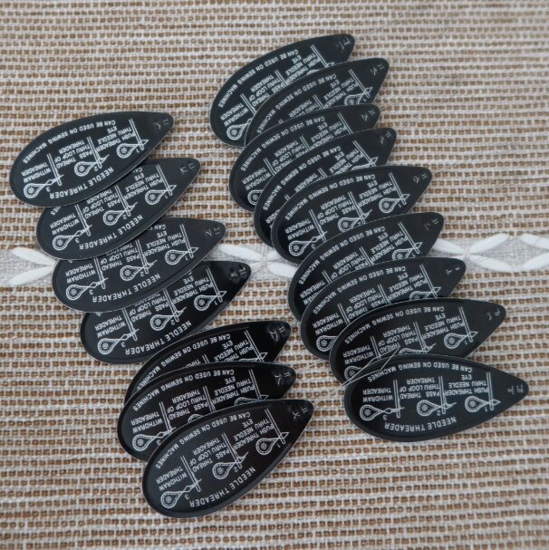 Dụng cụ xỏ chỉ