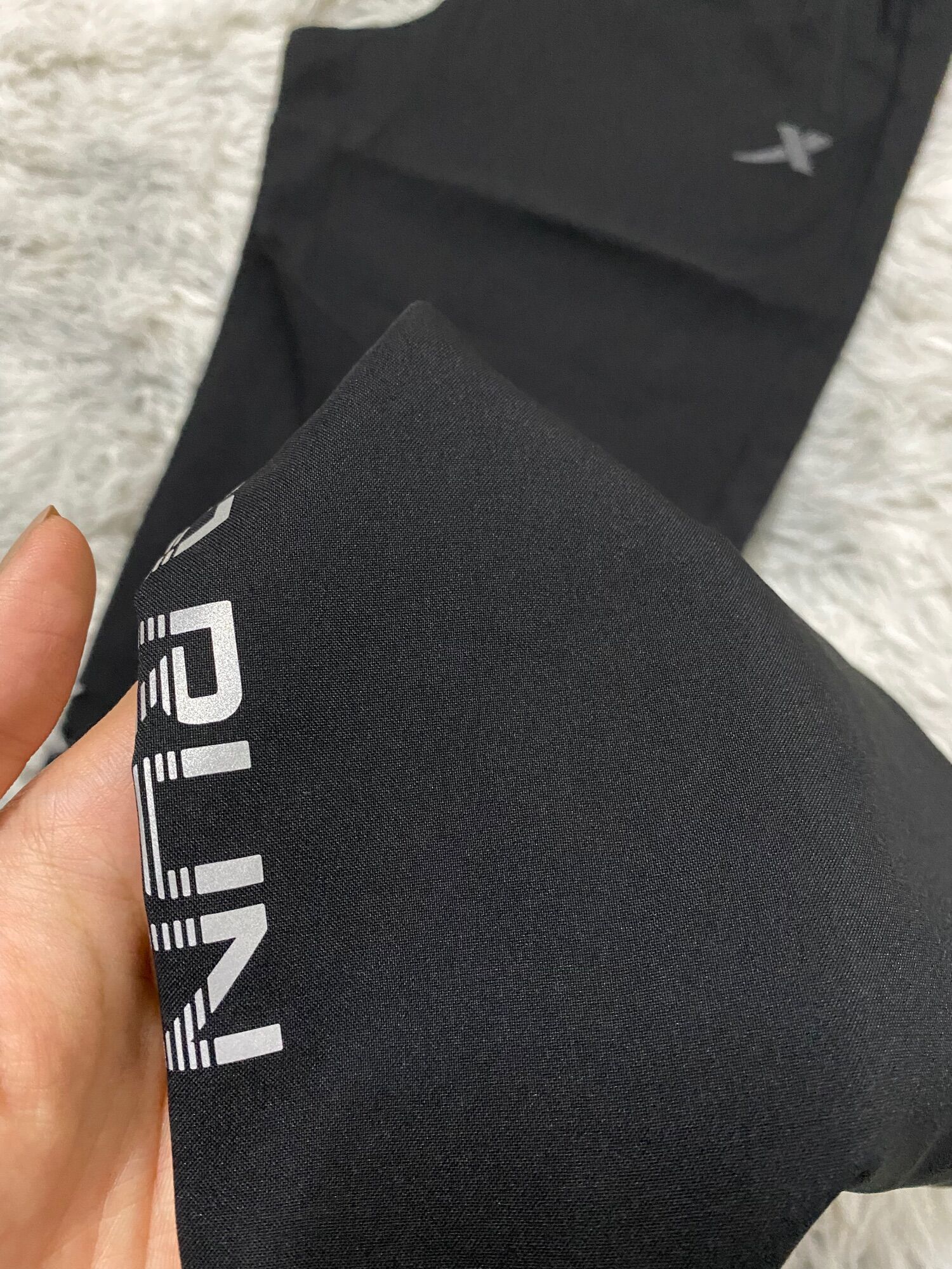 (Size L) quần gió nam Xtep 979229985039