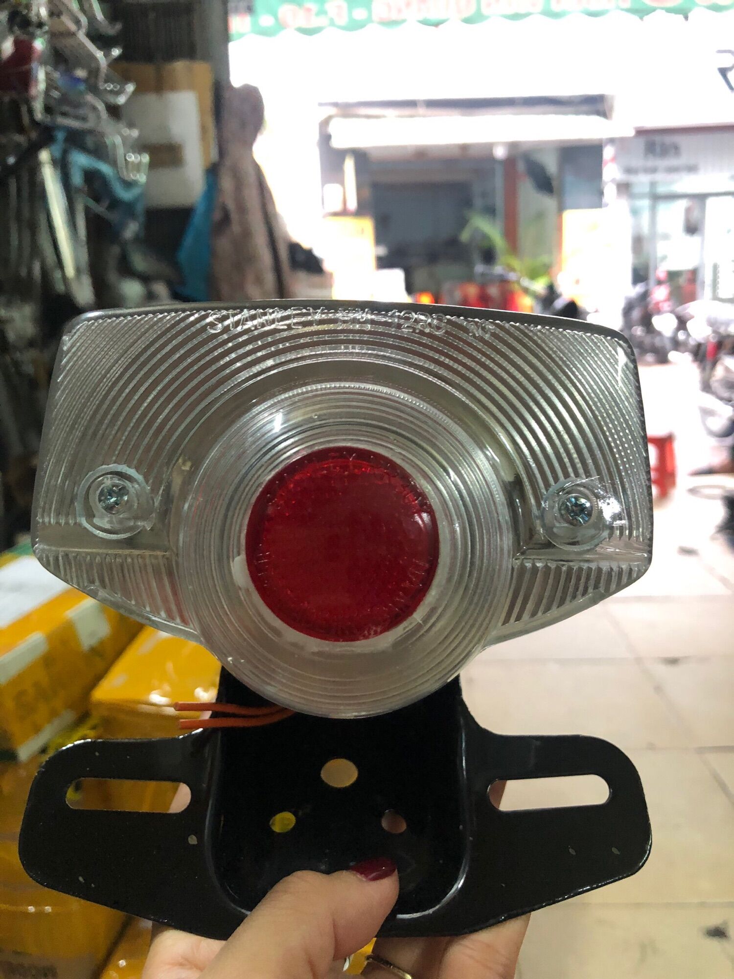 Đèn lái CD chụp trắng đồng tiền đỏ