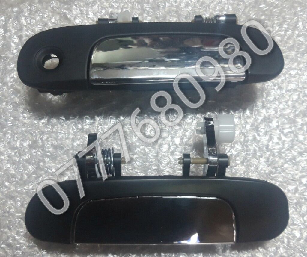 TAY MỞ CỬA NGOÀI FORD LASER ( GIÁ 1 CÁI )