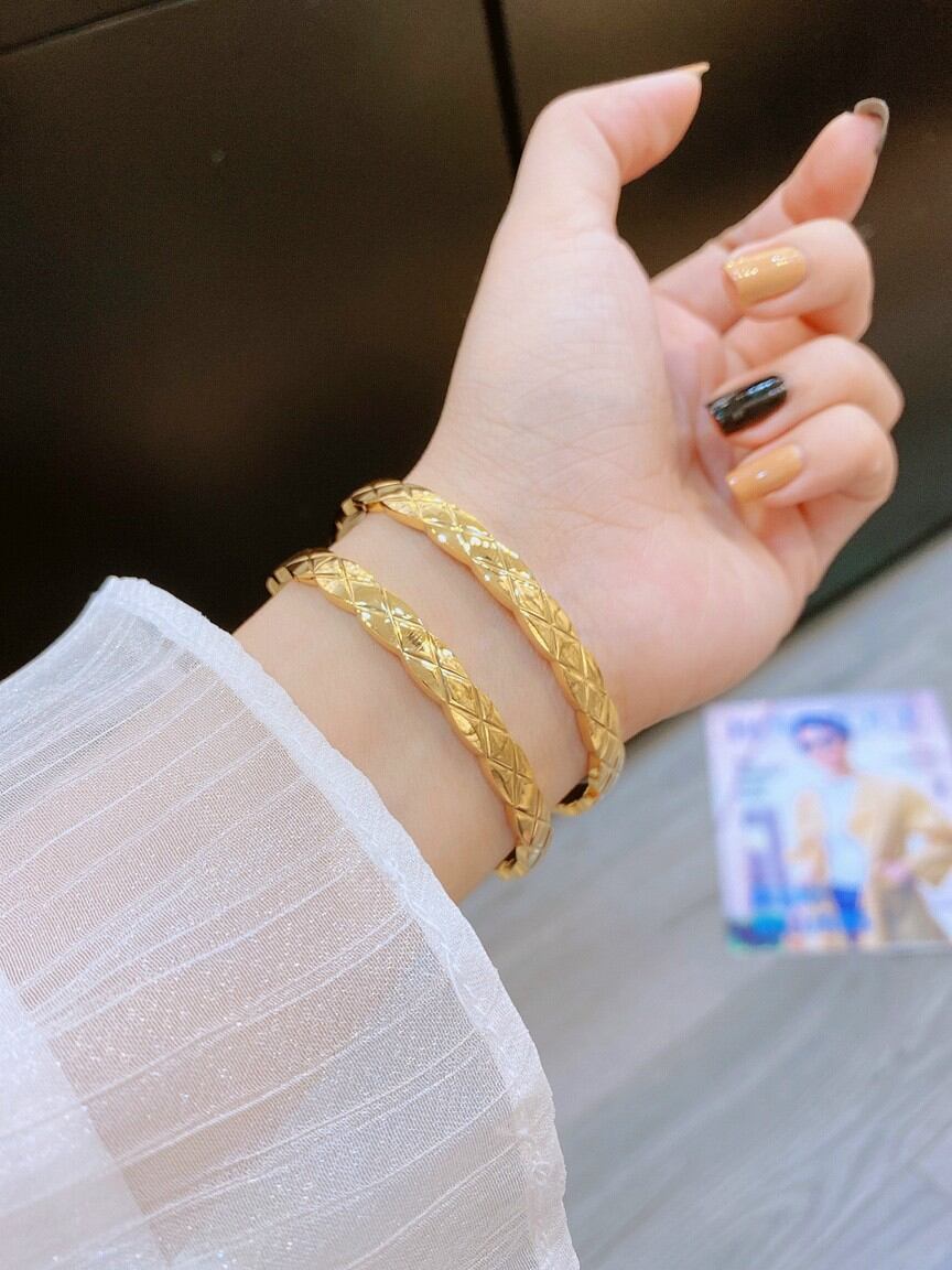 TT4972 - Vòng tay titan chạm X (màu vàng)
