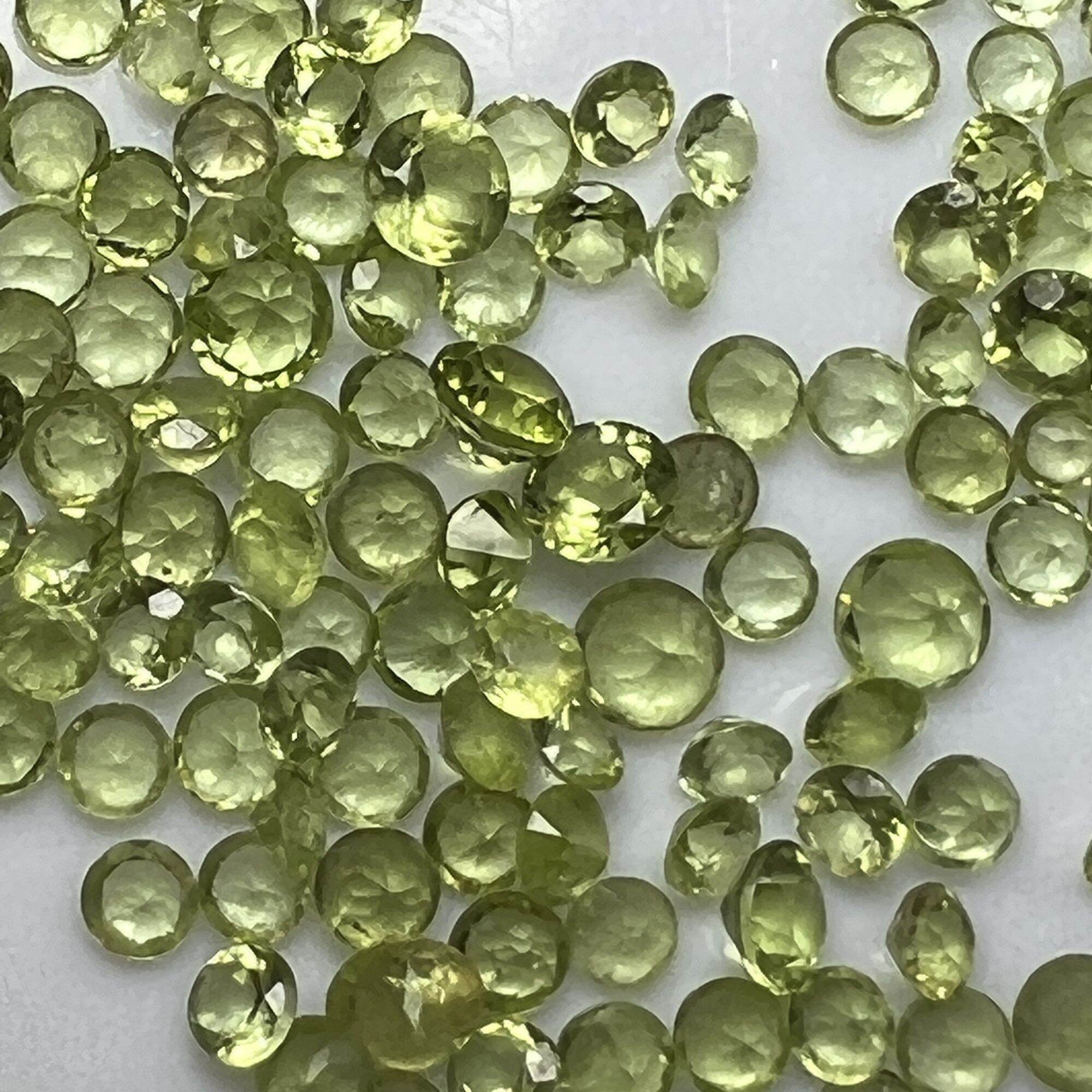 315-GIÁ 1 VIÊN ĐÁ PERIDOT TẤM ( THIÊN NHIÊN) 3 ly
