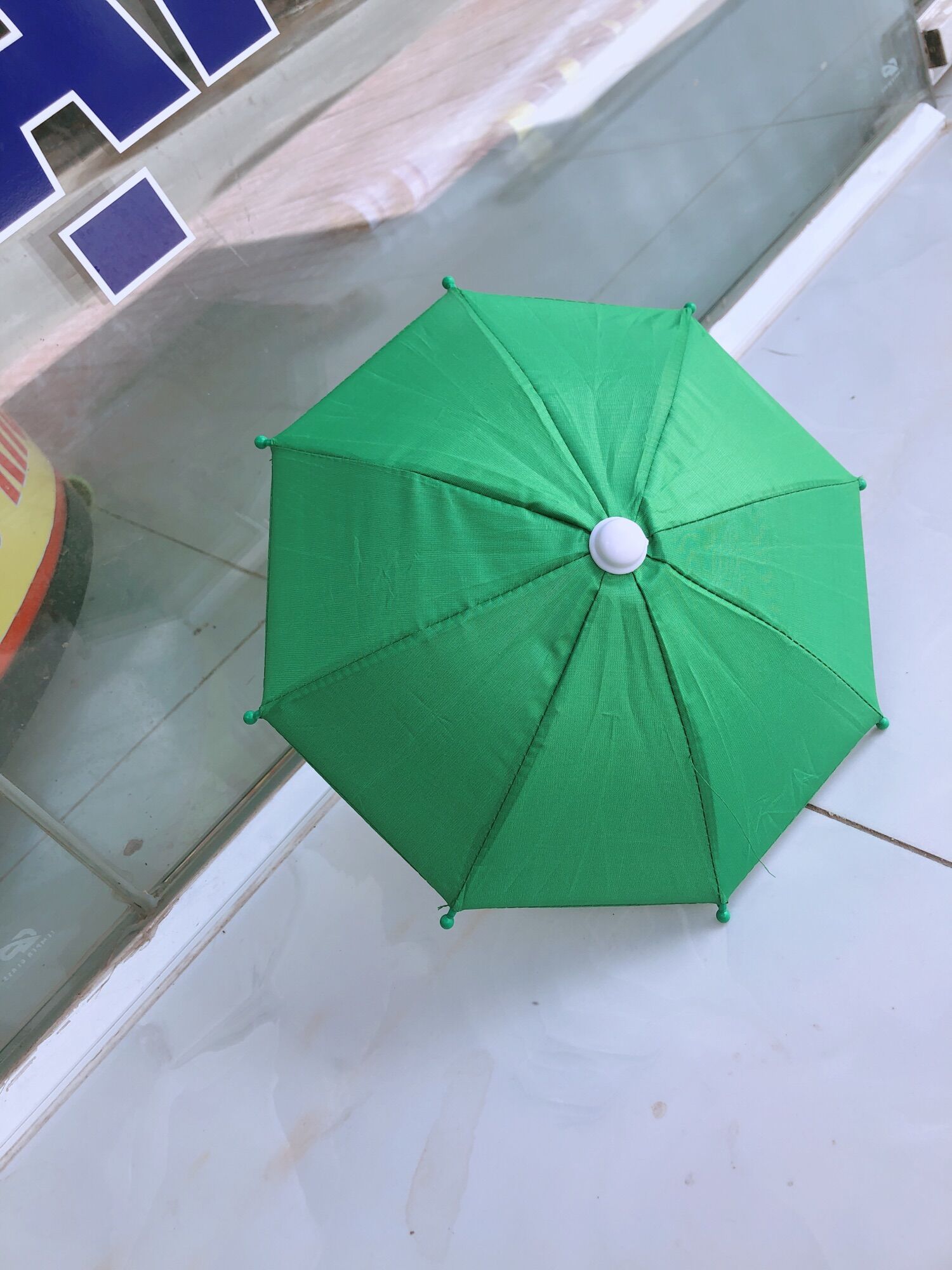 Dù mini che điện thoại