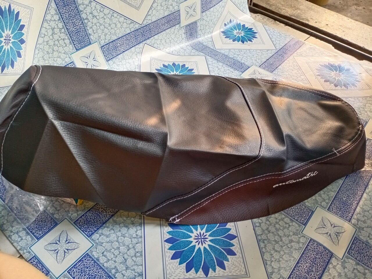 Da bọc yên xe Utimo