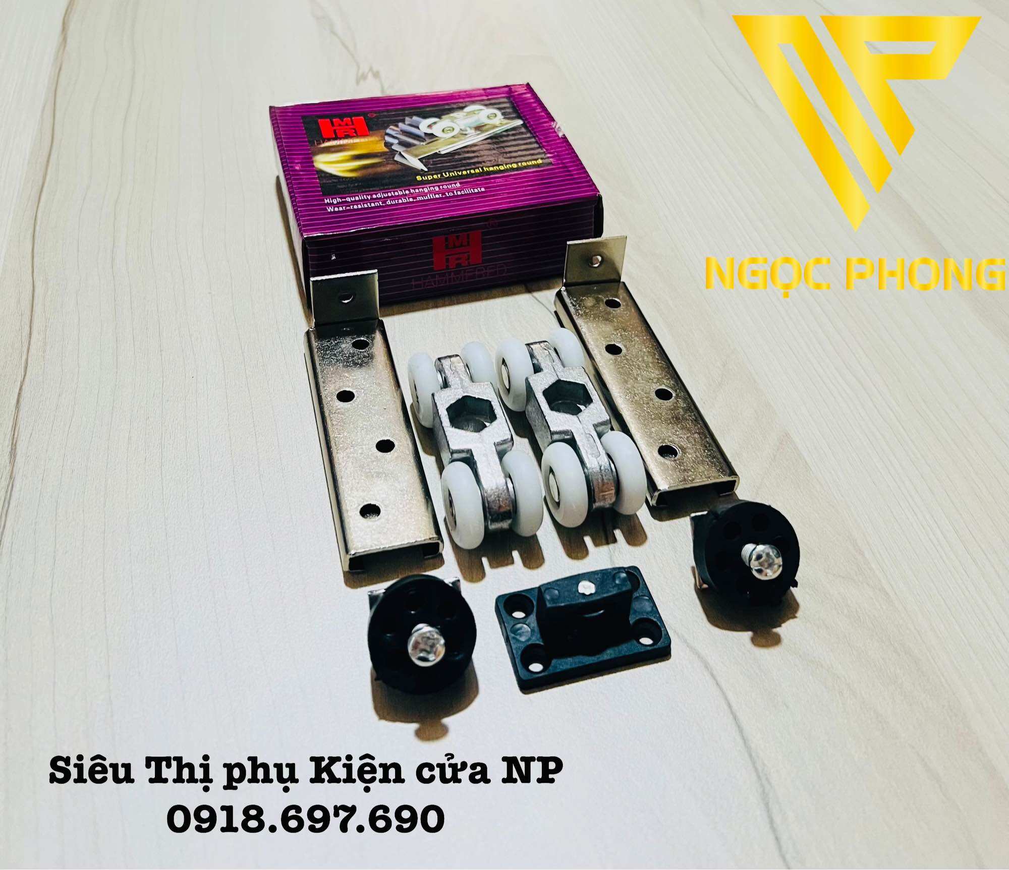 Bộ bánh xe treo cửa lùa nhôm - sắt -gỗ hộp tím