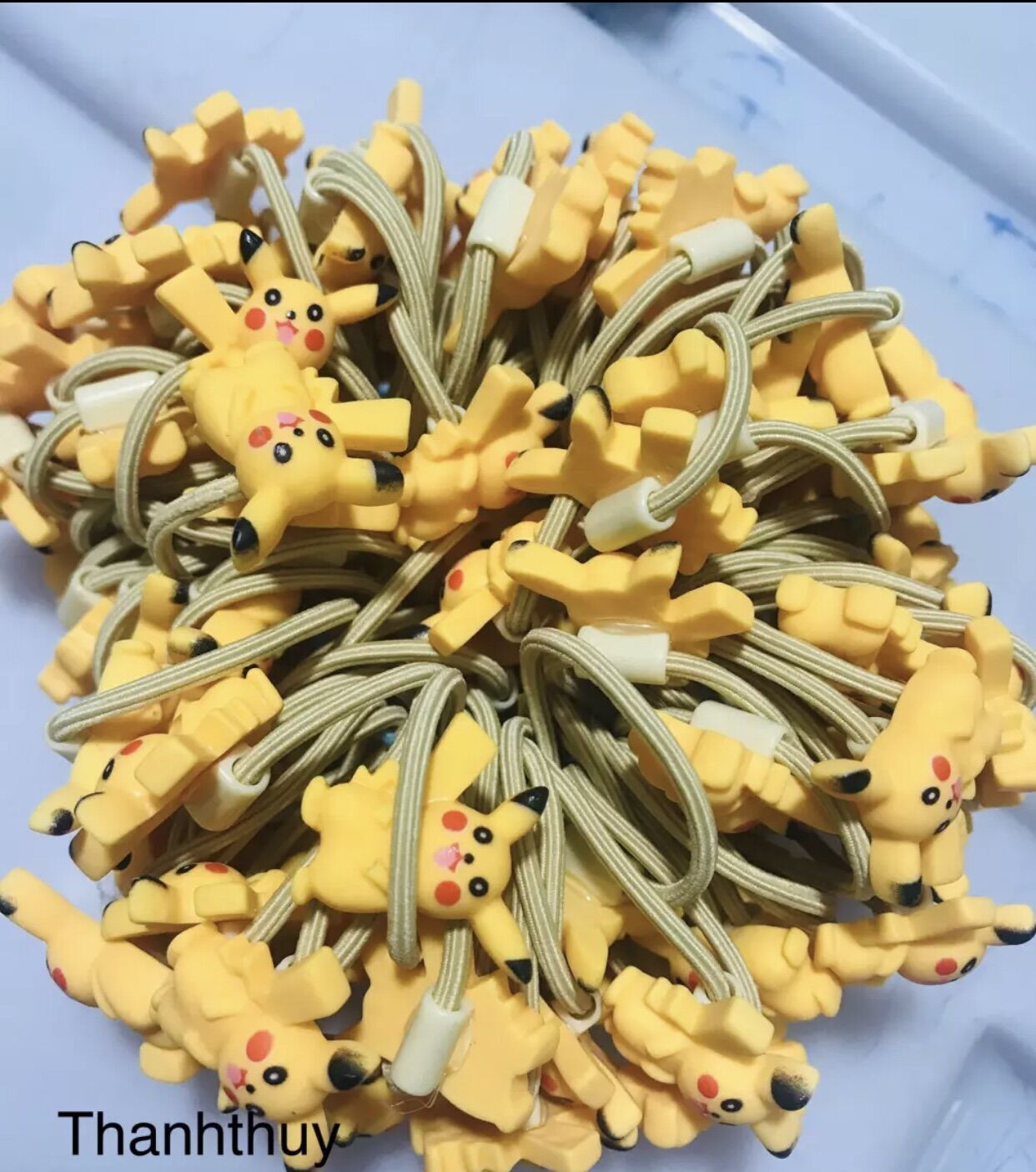 Sỉ _ 100 Dây cột tóc Hình Picachu Nhỏ (Hình thật)