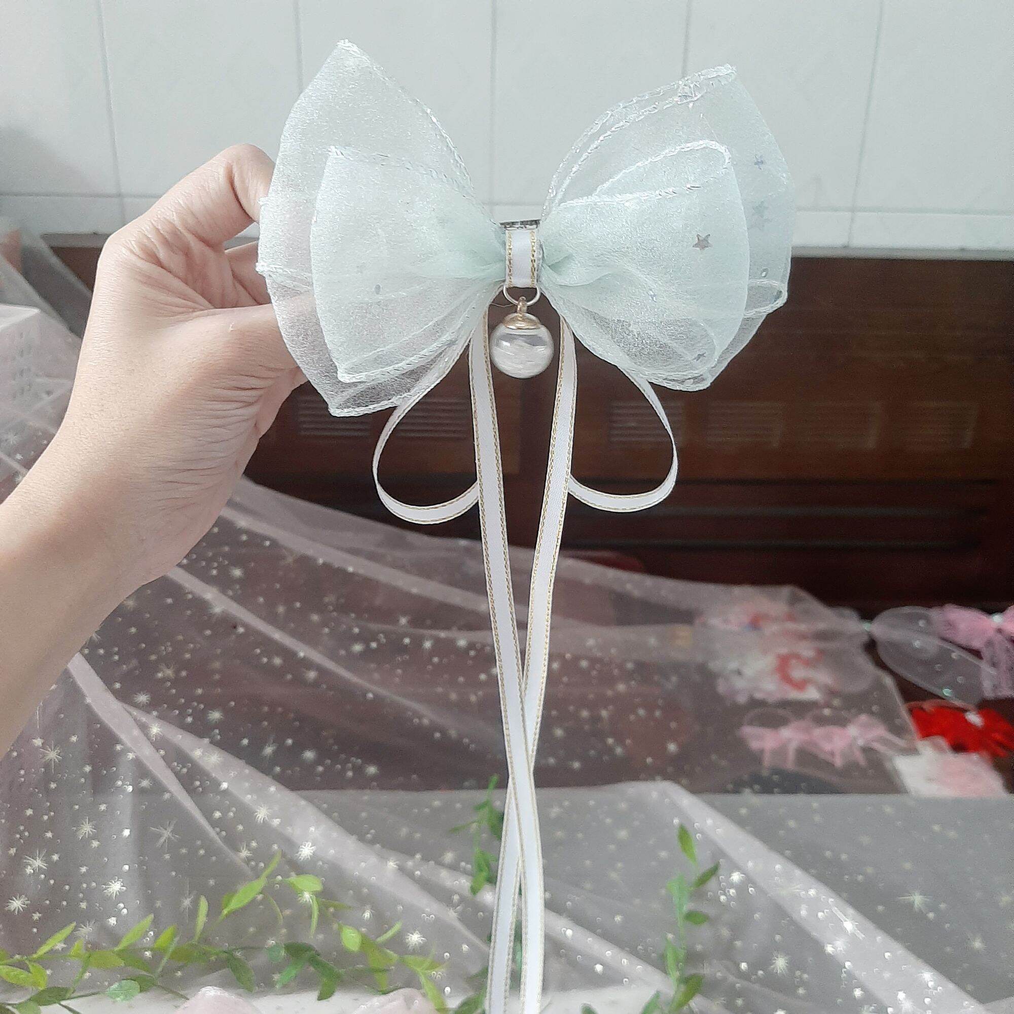 Kẹp tóc nơ trăng sao đính ngọc lấp lánh (mua 10 tặng 1)
