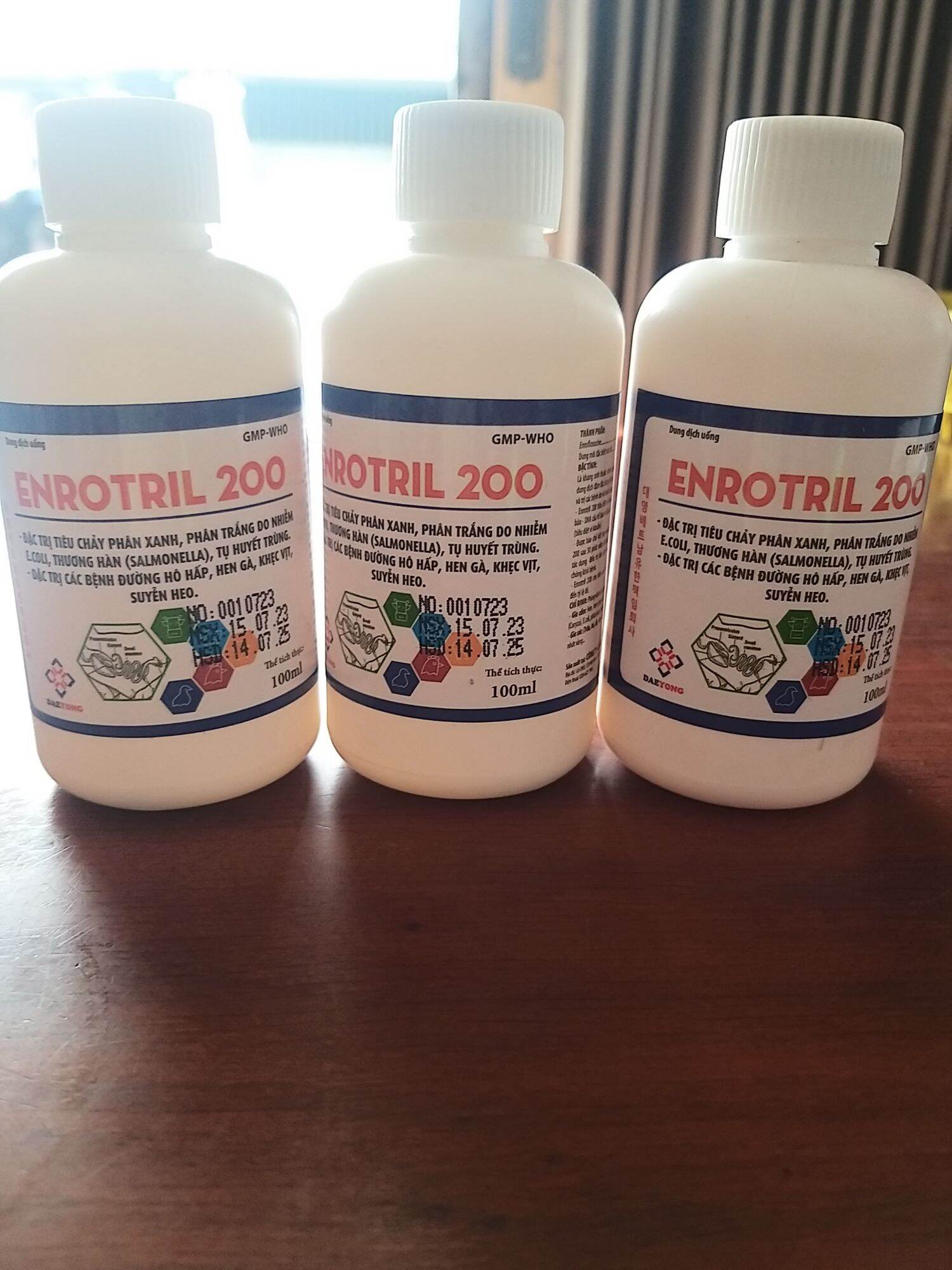 ENROTRIL 200 , tiêu chảy phân xanh, phân trắng do Ecoli, thương hàn, tụ huyết trùng, các bệnh hô hấp, hen gà, khẹc vịt, suyễn heo