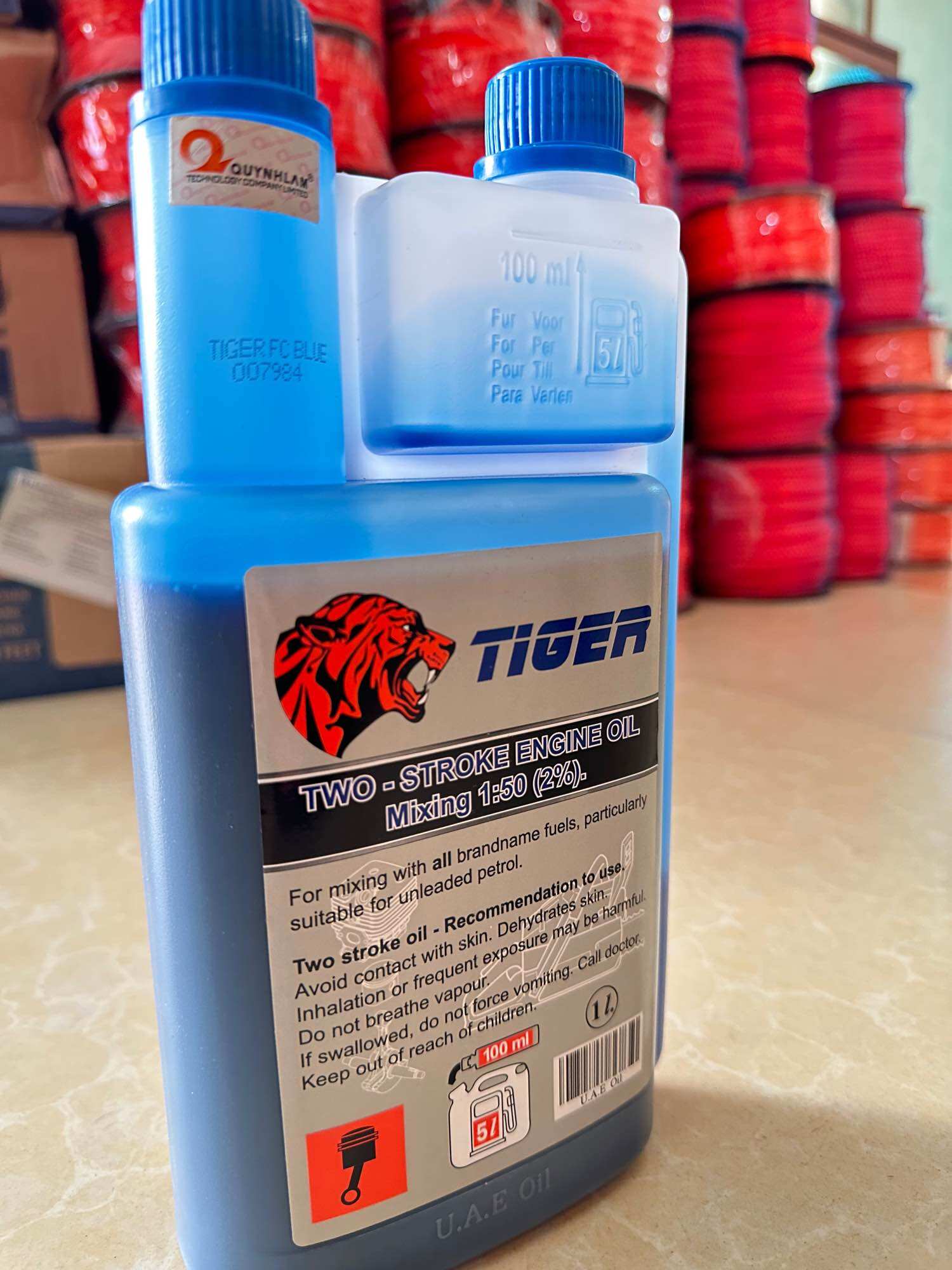 Dầu ( nhớt ) 2 thì Tiger xanh