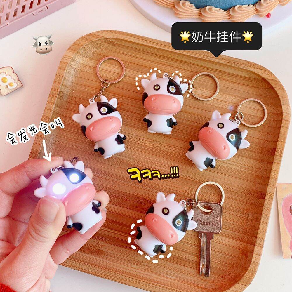 Móc khóa bò sữa phát sáng độc đáo