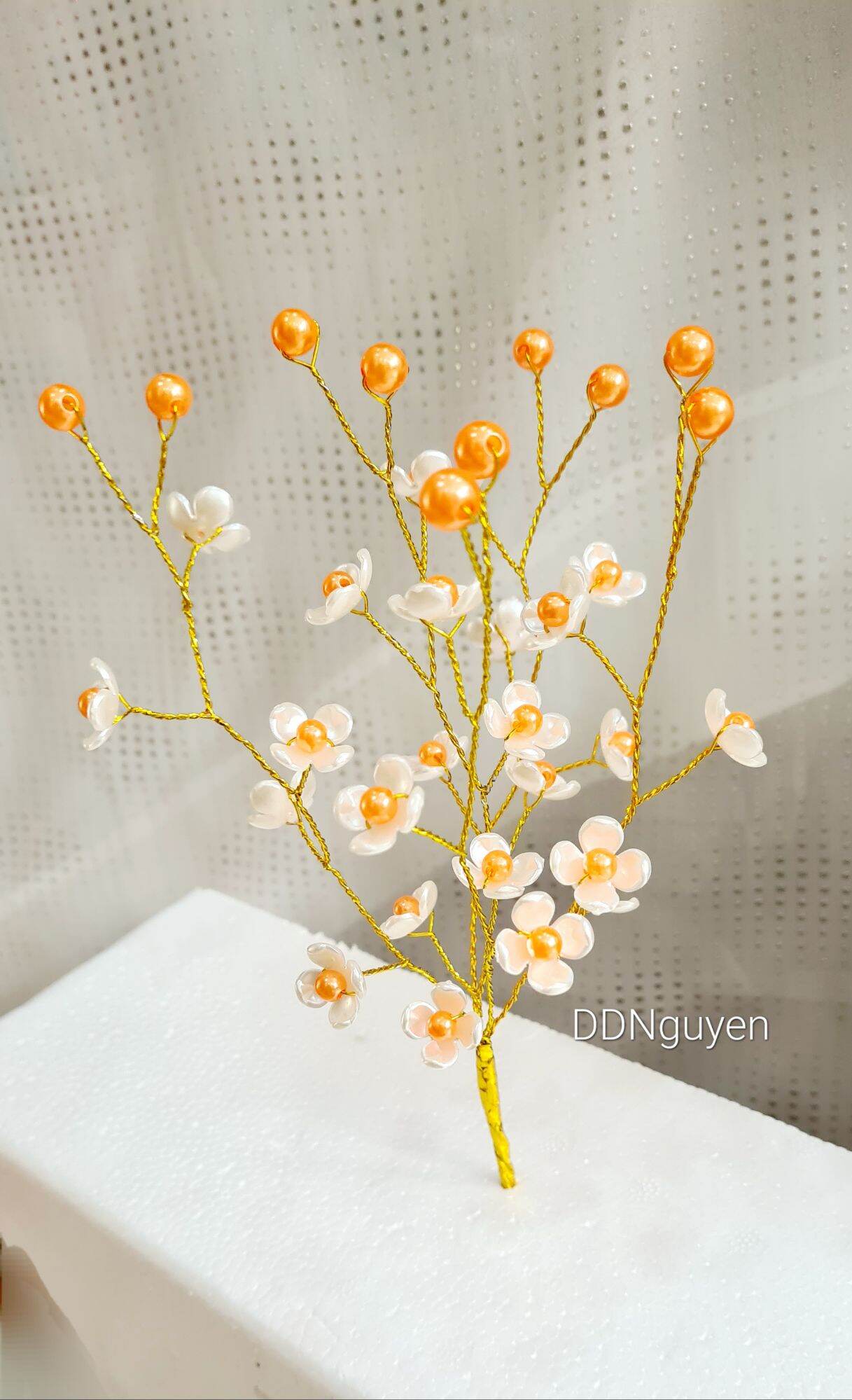 Thành phẩm hoa hạt cườm. Mẫu: Hoa hạnh phúc 4 cánh nhí