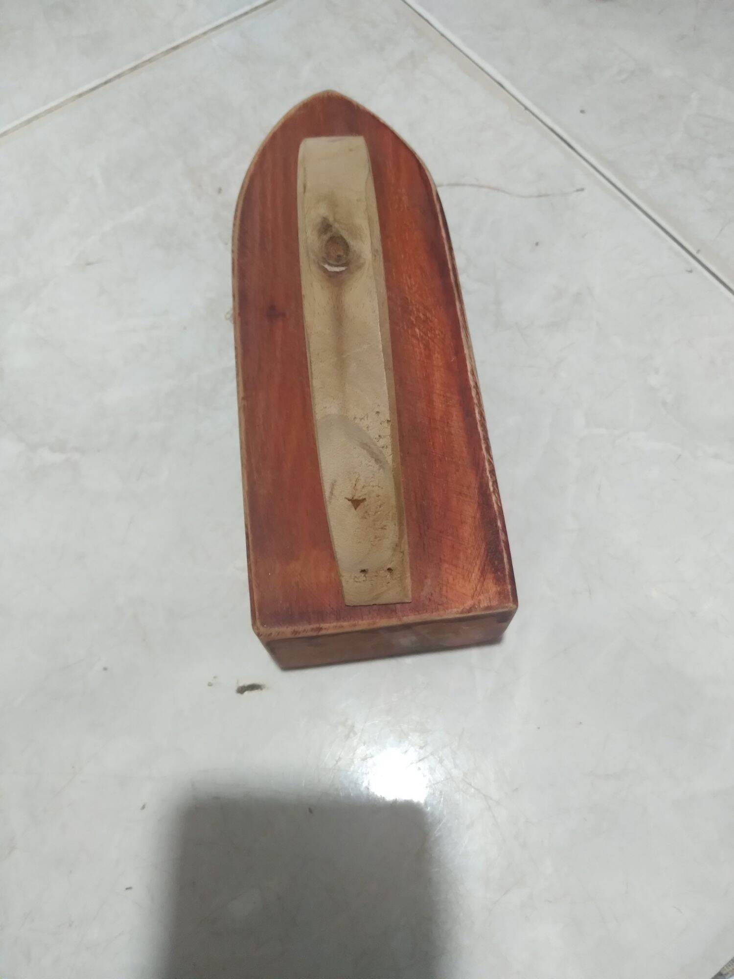 Cục gỗ ủi có tay cằm ,giá bán 35000 ,1 cái