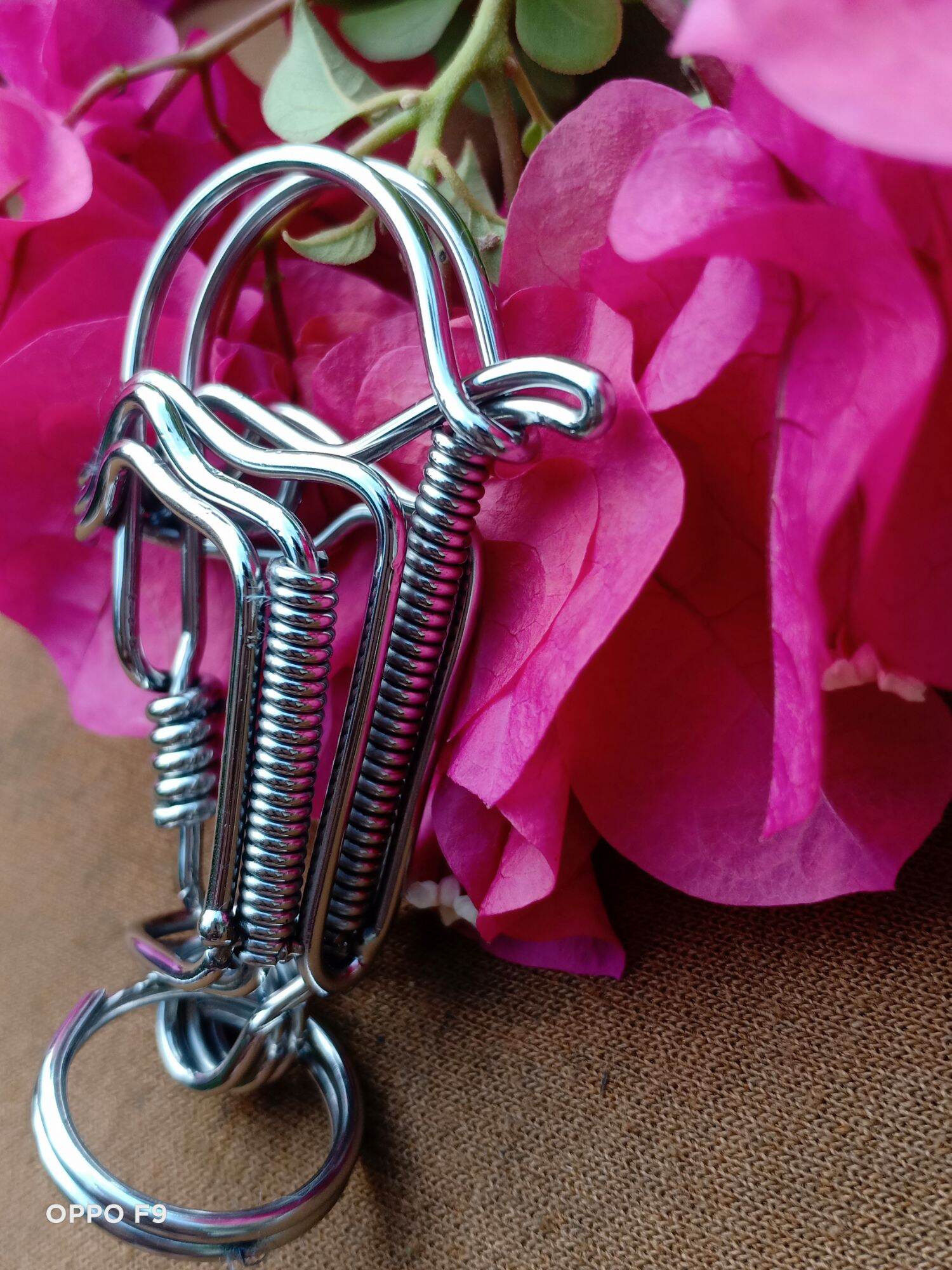 Móc khoá inox ..uốn thủ công