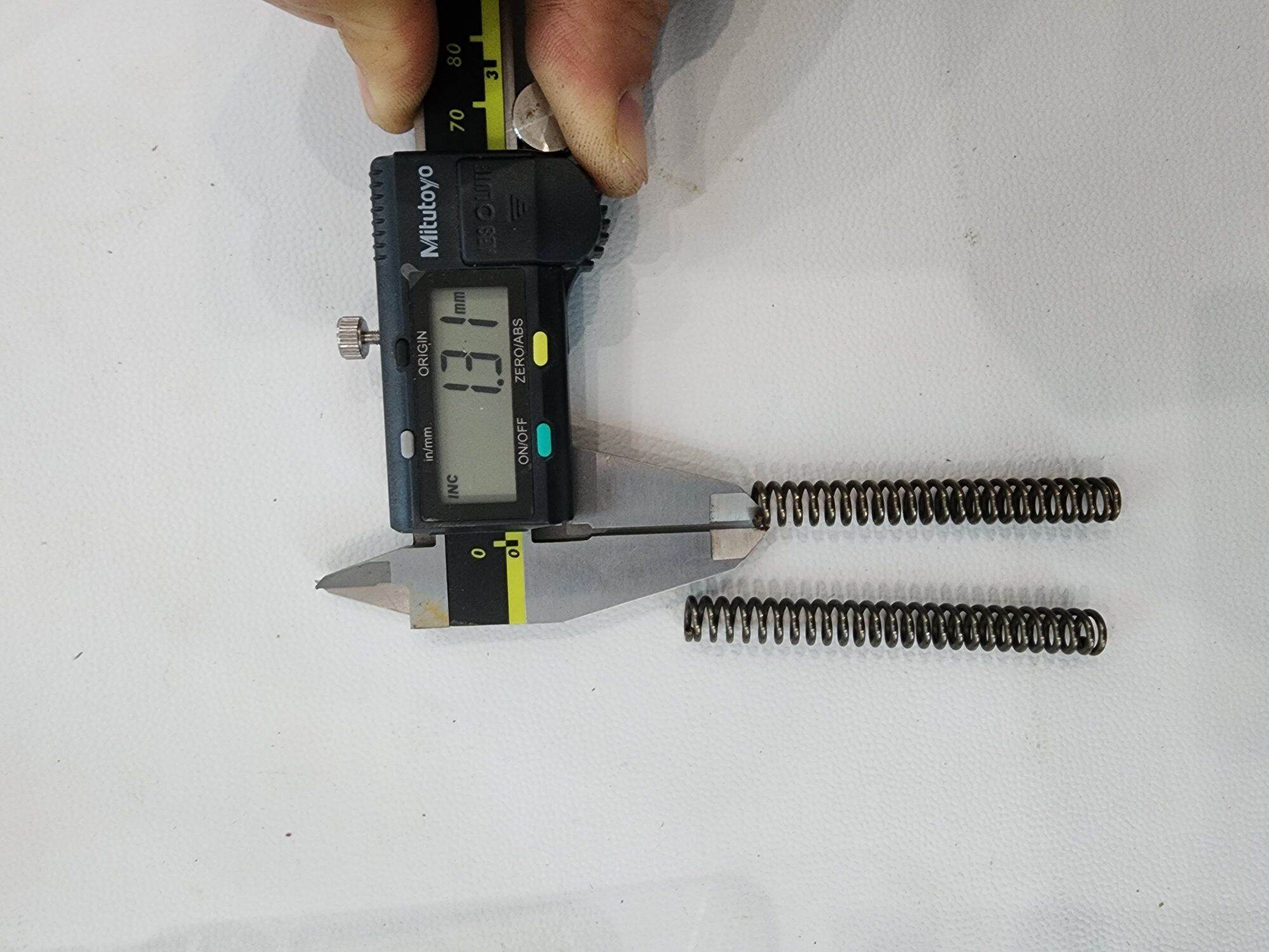 Lò xo phi 8 sợi 1.3 dài 6cm 7cm
