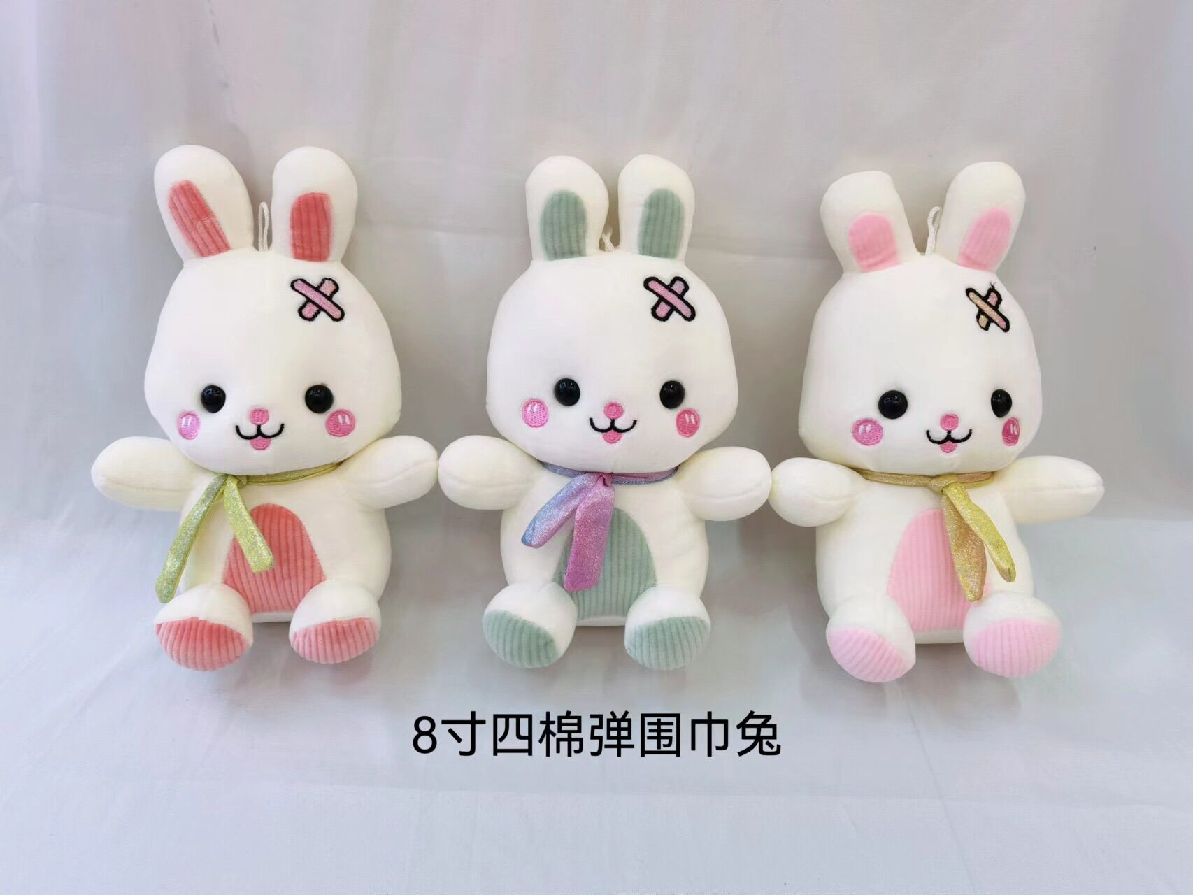 Gấu nhồi bông thỏ đeo nơ siêu xinh