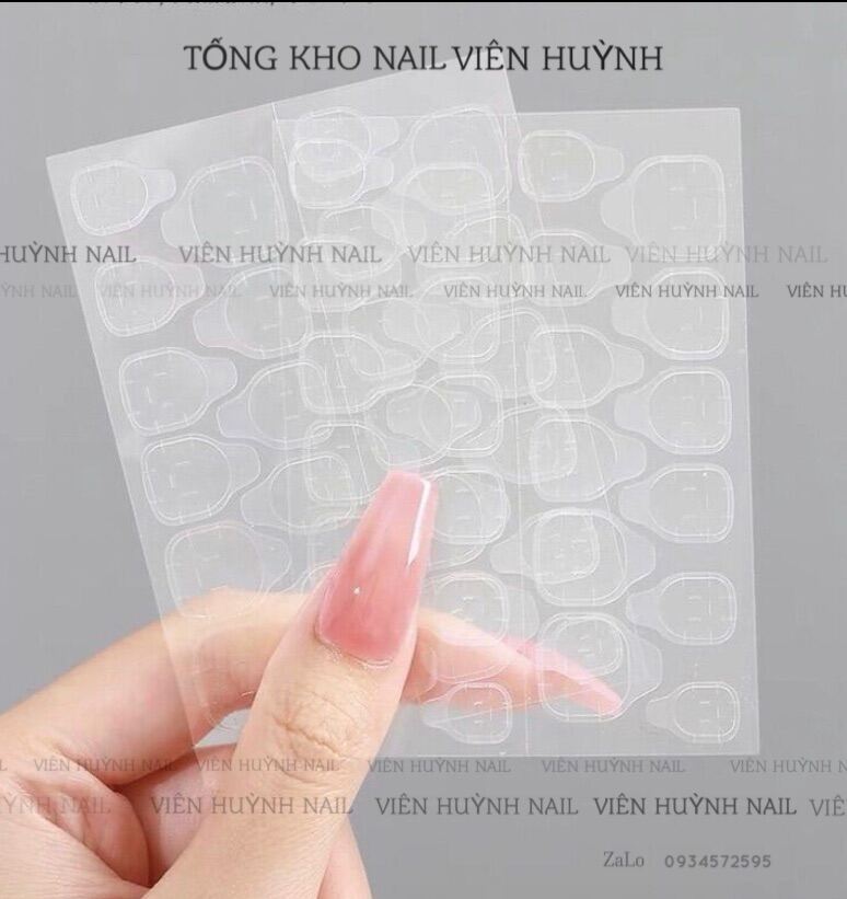 Miếng keo dán móng giả 2 mặt silicon , tờ gồm 24 miếng dán