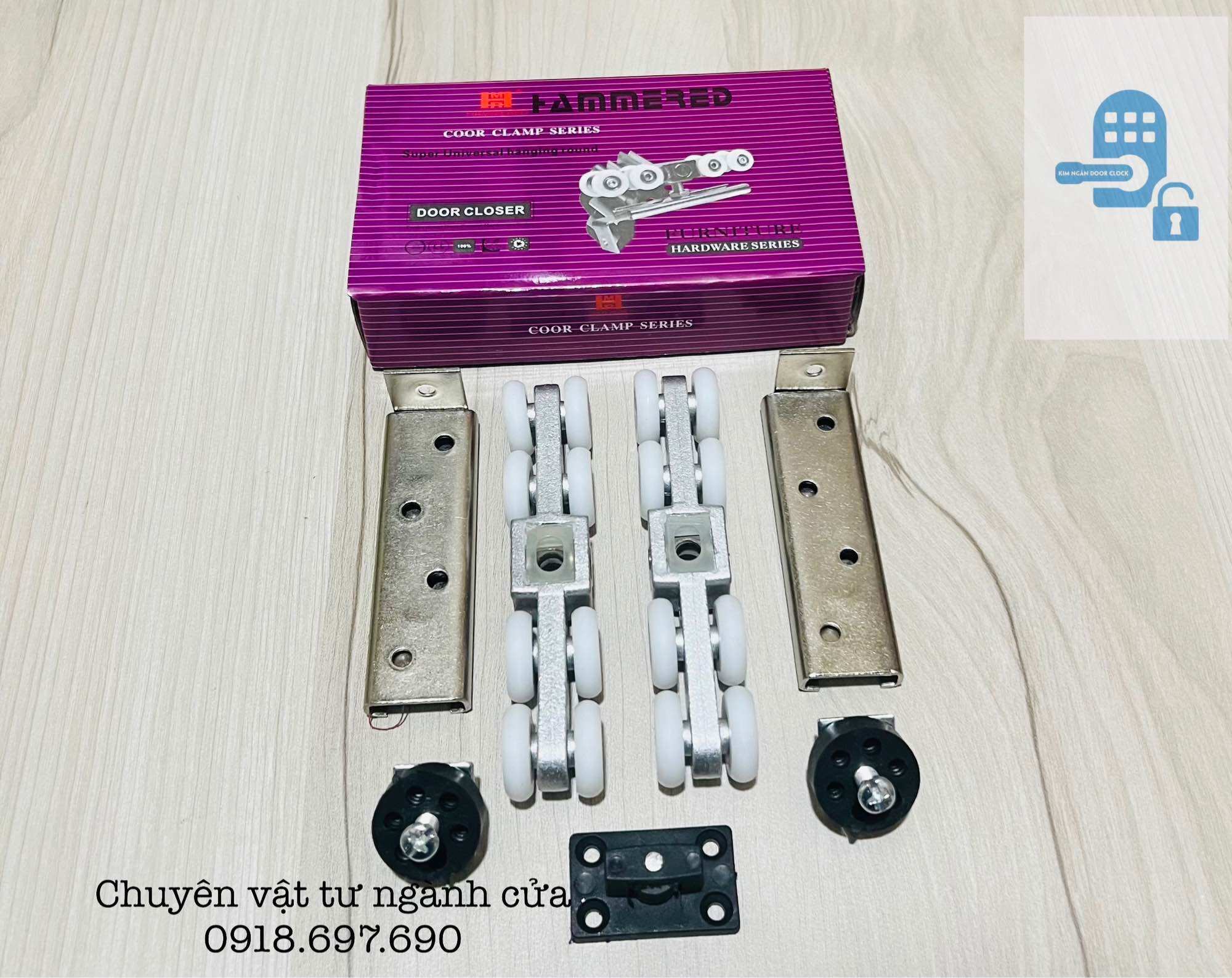 Bộ Bánh xe cửa lùa treo hộp tím sử dụng cho cửa gỗ - sắt - nhôm