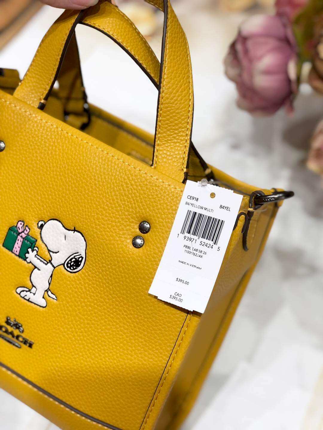 Túi C.oach X Peanuts Dempse họa tiết siêu đẹp