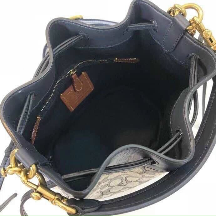 C0ACH Field Bucket Bag In Signature