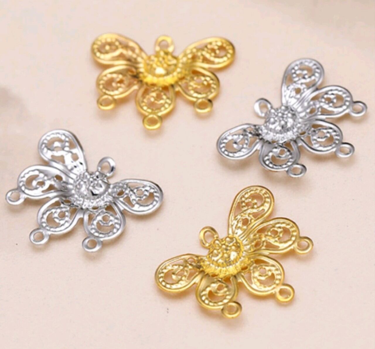 Miếng kim loại hình bướm mã 24