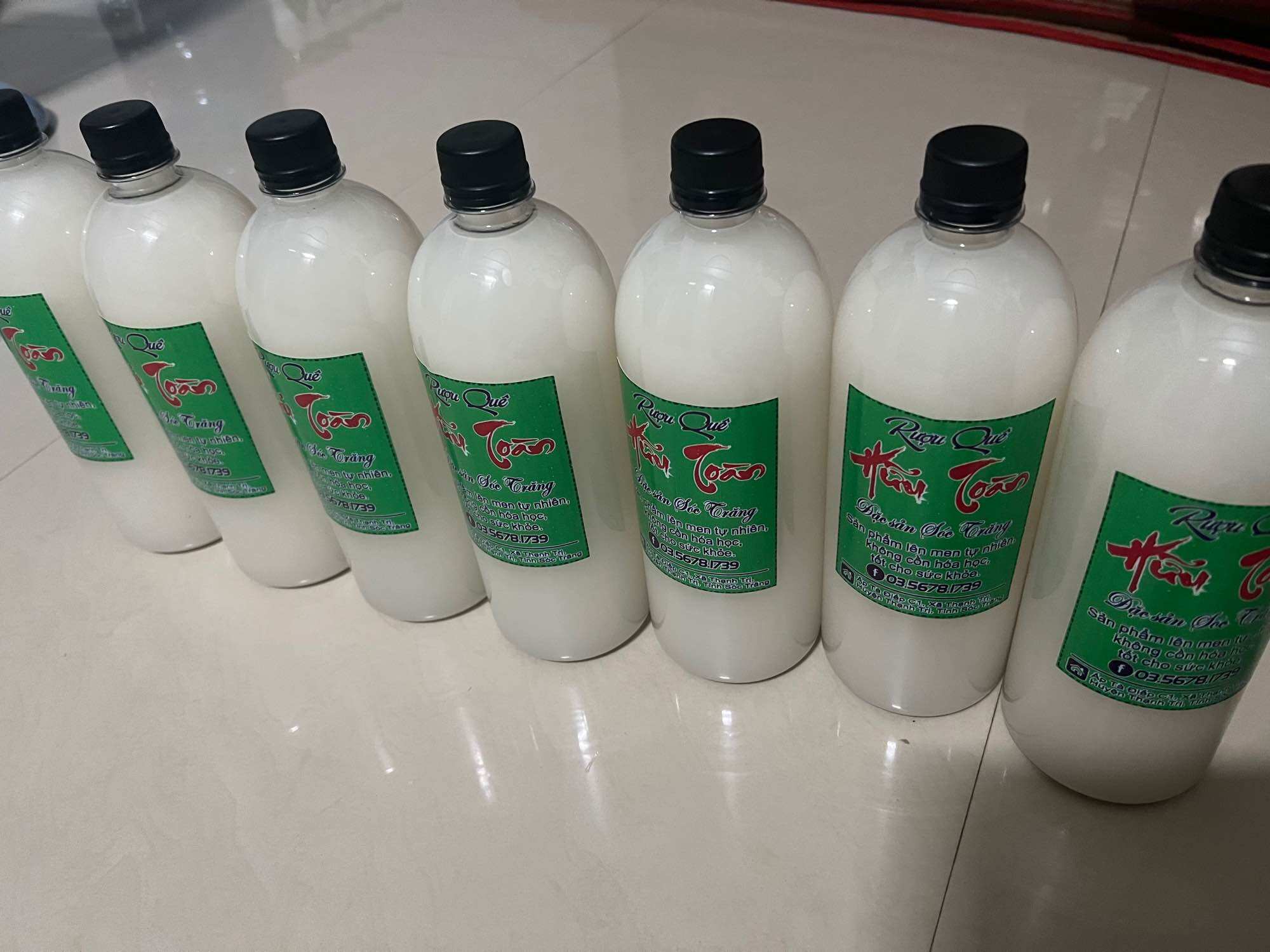 Rượu nếp sữa nhà làm, chai 1 lít 50k