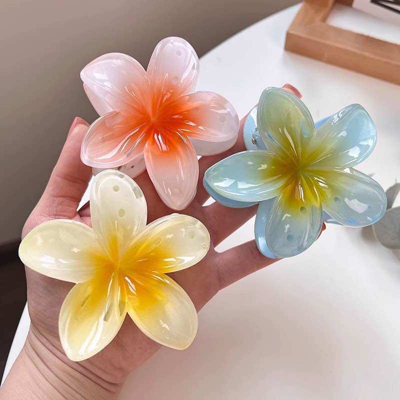 Kẹp tóc hoa sứ nữ càng cua xinh xắn