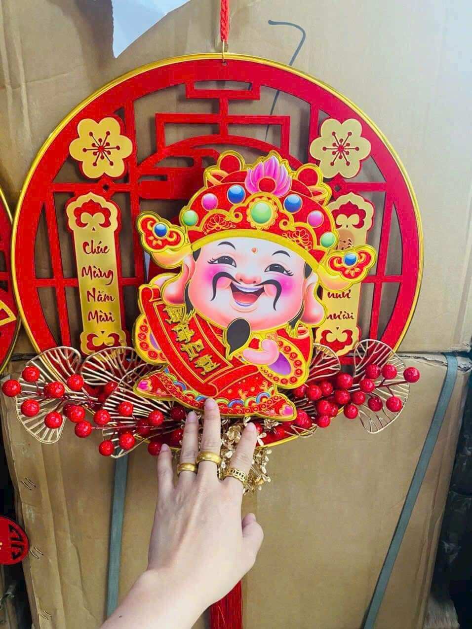 Thần tài lắc lư đầu gọi thần tài may mắn