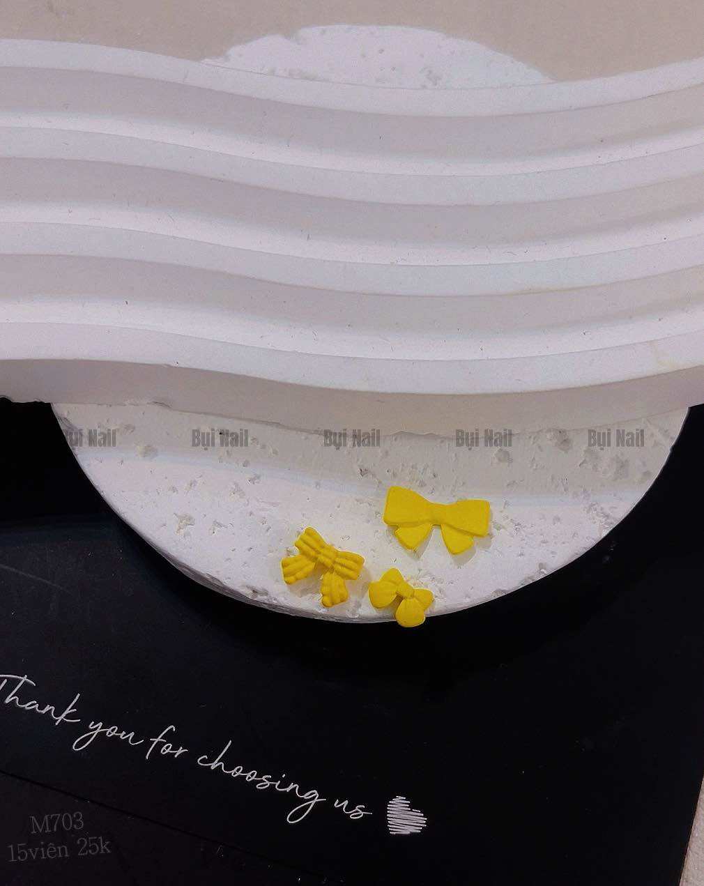 CHARM NƠ VÀNG SET 15 VIÊN M703