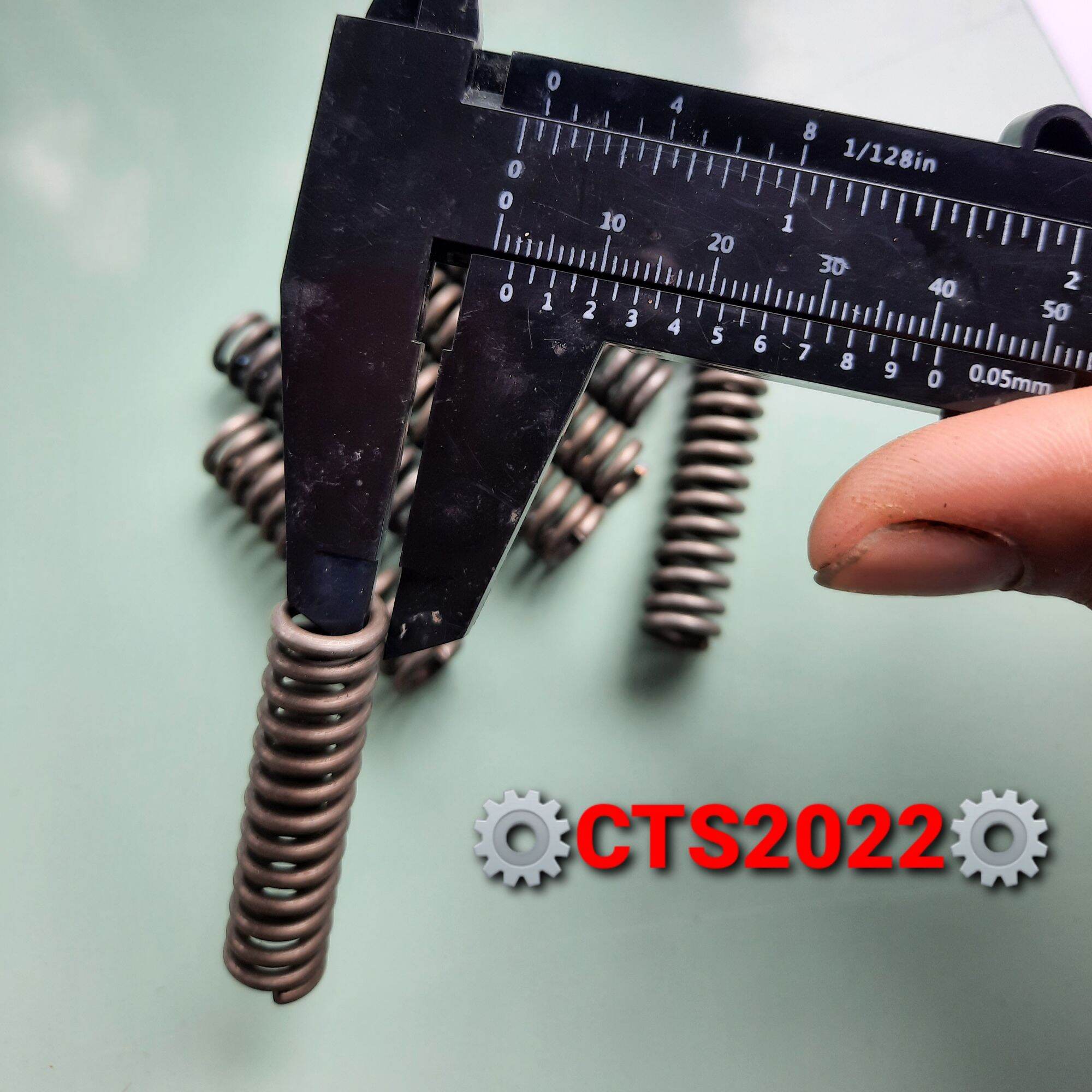 Lò xo nén phi 11 sợi thép 1.8 dài 45mm