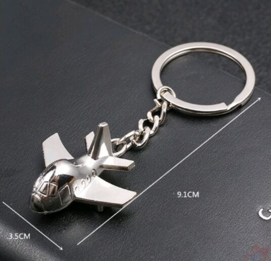 móc khóa hình máy bay đầu tròn siêu cute