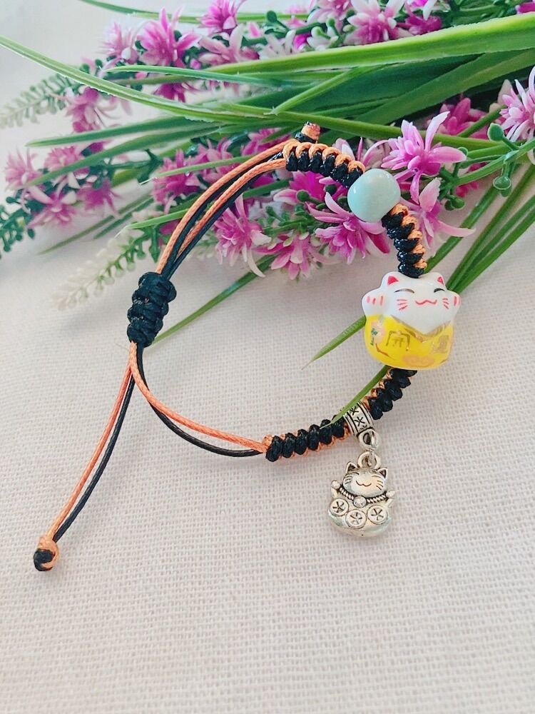 Vòng tay mèo gốm sứ may mắn