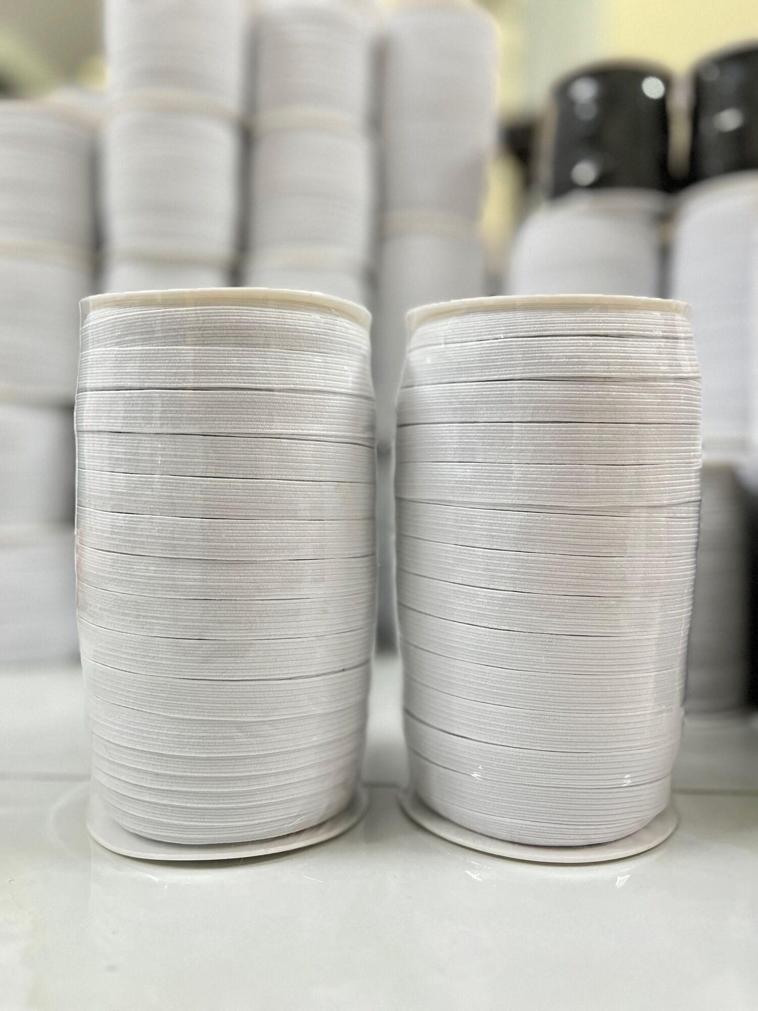 Thun bản 1phân2 màu trắng cuộn dài 100m