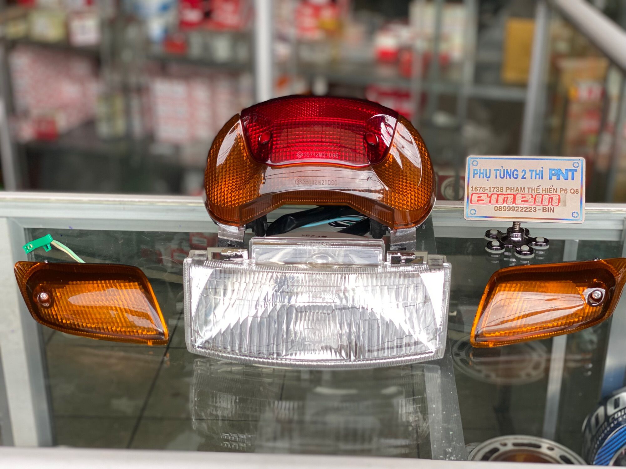 Bộ choá đèn trước sau satria 2000 Zin