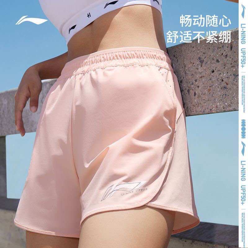Quần short gió nữ Lining AKST754