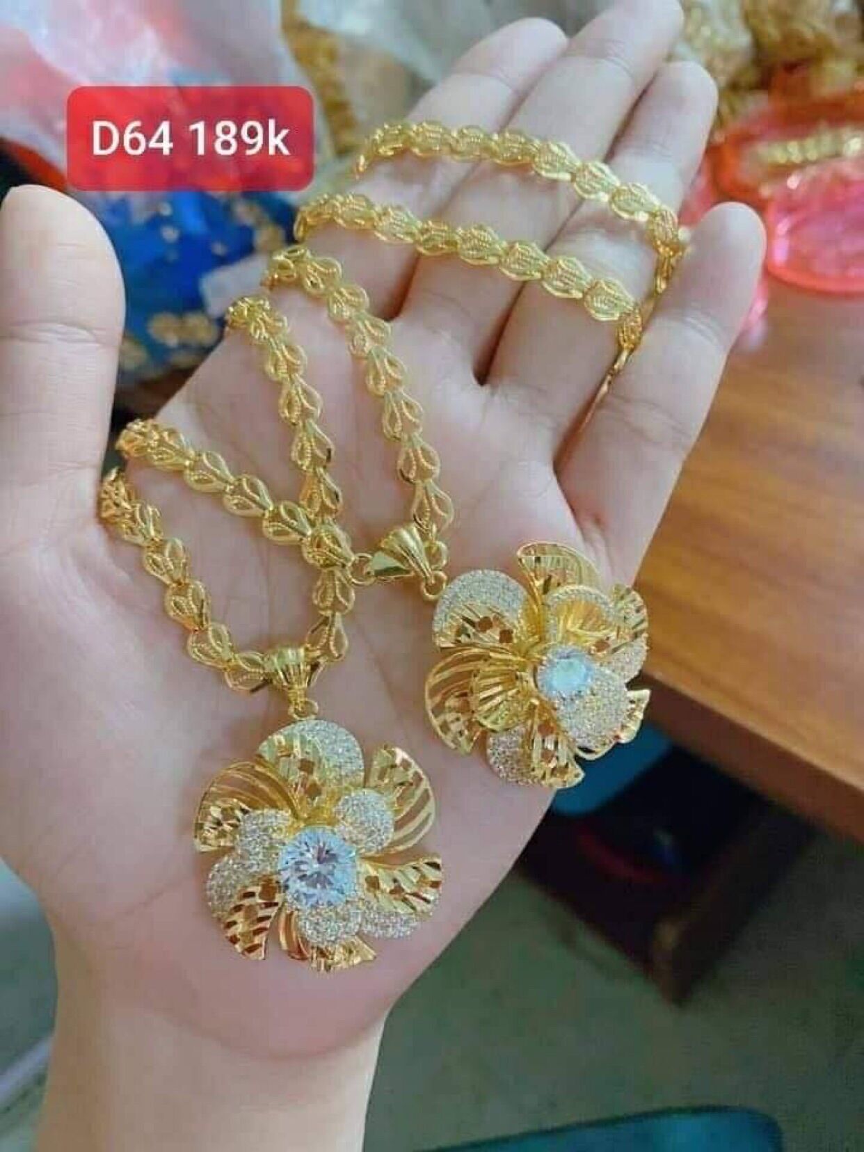 Dây chuyền mạ vàng măt hoa mai