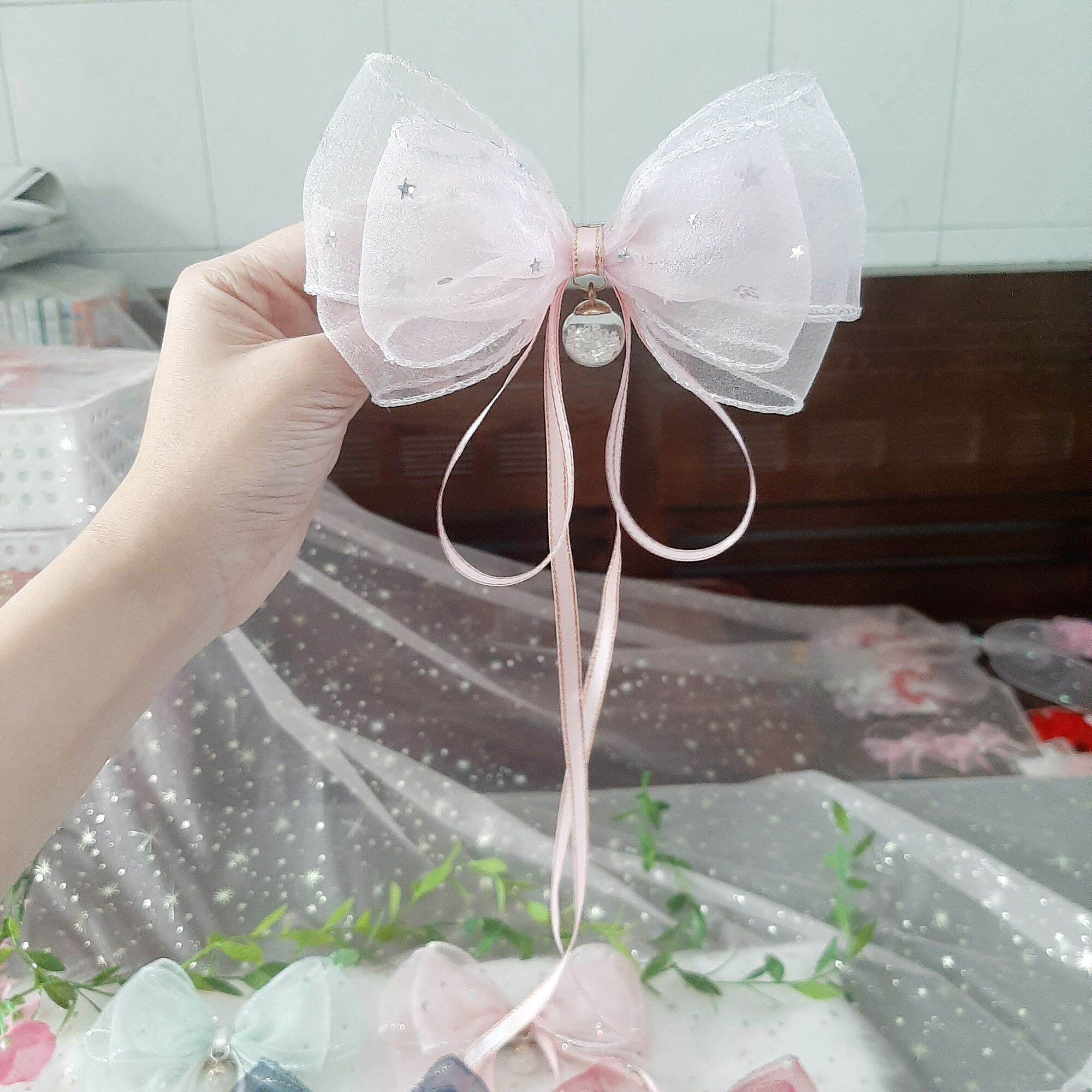 Kẹp tóc nơ trăng sao đính ngọc lấp lánh (mua 10 tặng 1)