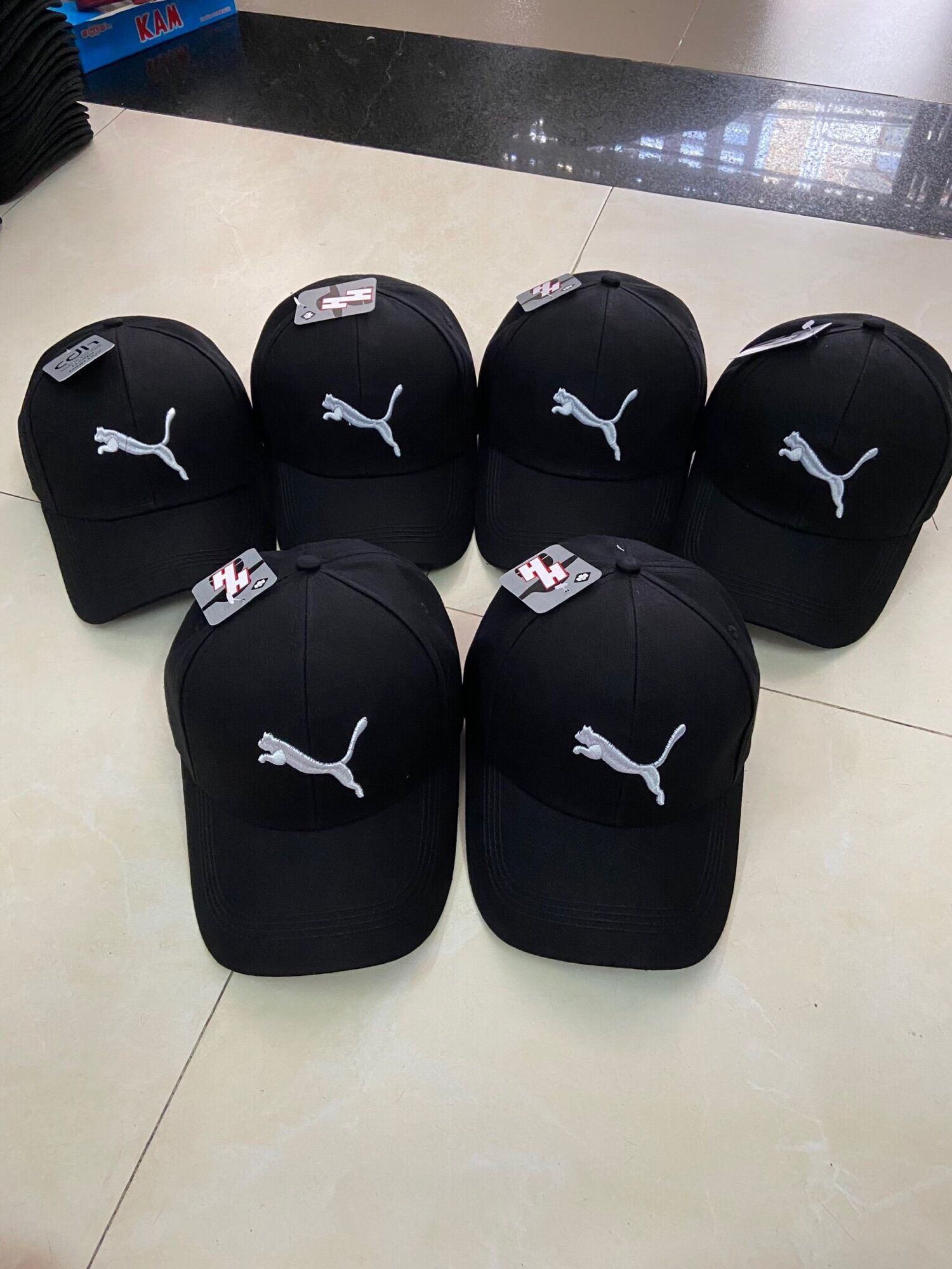 Nón kết kaki đen thêu nhiều logo